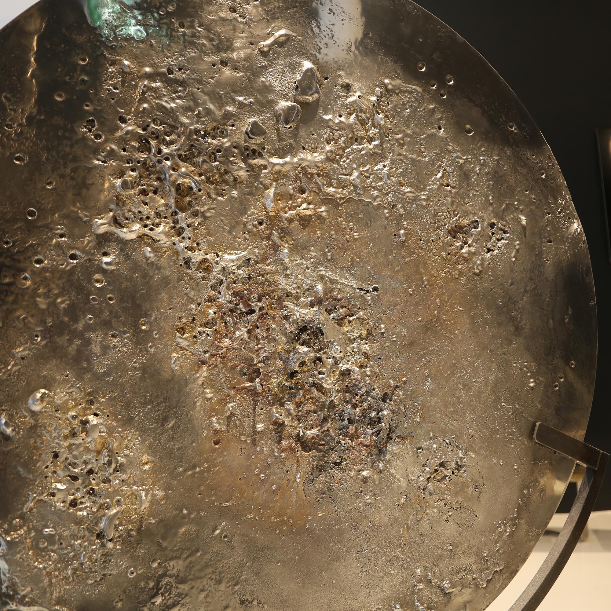 In stock: This piece of art is a pure Alchemy experimentation with pewter, made in France.
It is made of melted pewter, being subjected to Hot-cold thermal shocks. Cooled bubbles, colored stains, craters emerged from this secret experimentation. One