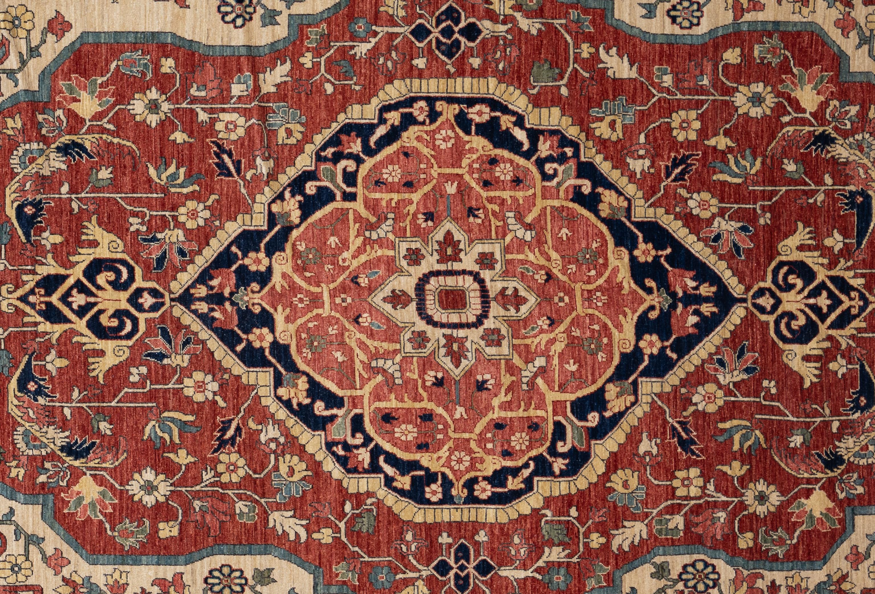 Indulge in timeless elegance with this exquisite Serapi rug. Handcrafted with intricate motifs and vibrant hues, it exudes warmth and sophistication. Handwoven by master weavers and made of 100% wool, its plush texture promises both luxury and