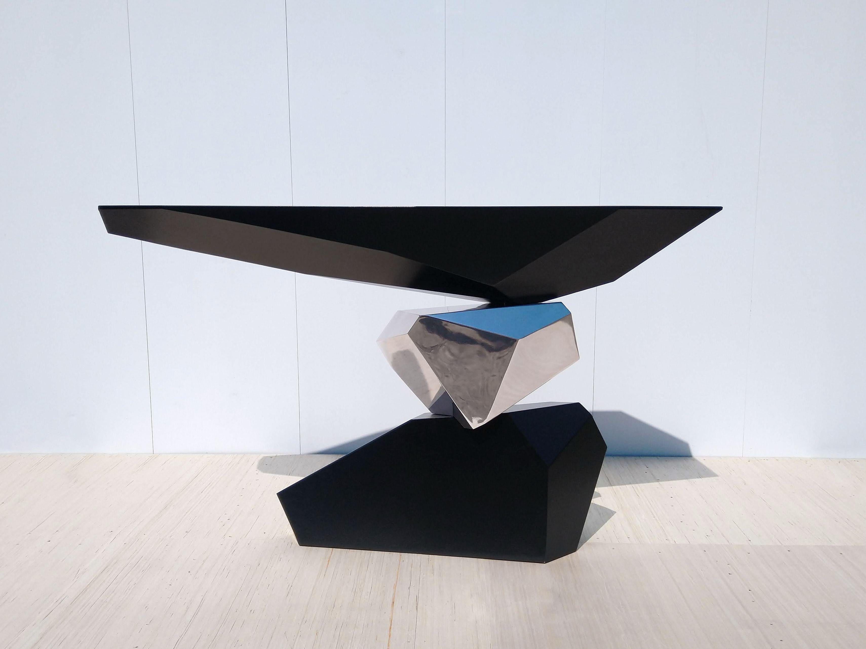 Serenity is a new single-piece console table by Christopher Duffy for Duffy London that appears to defy gravity, toying with visual perspective in a playful three-dimensional trompe l’oeil. An invigorating addition to any hallway, concourse or