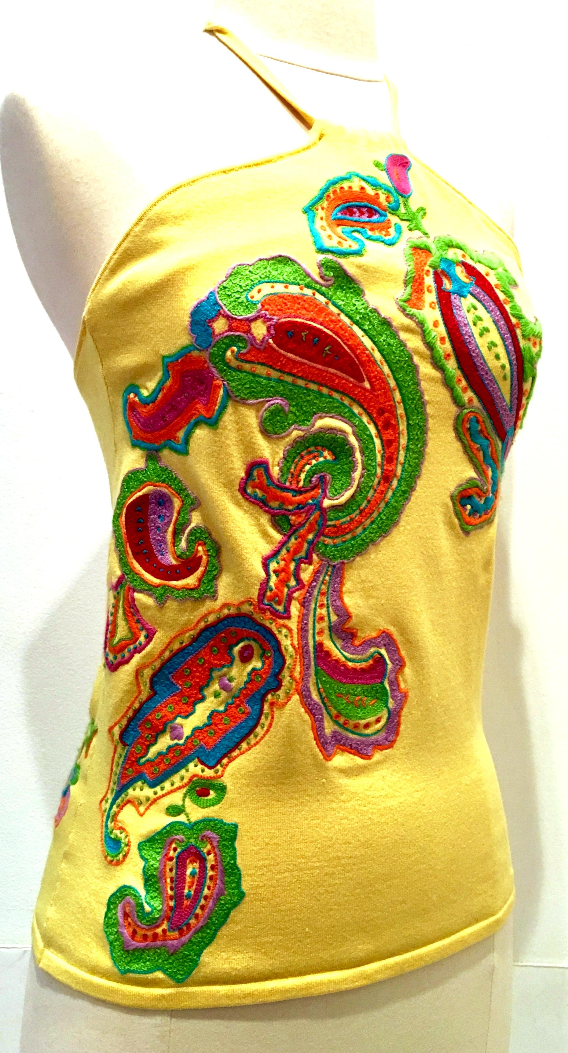 21st Century Silk Blend Bright Yellow Paisley Embroidery Halter Top By, Ralph Lauren. This like new silk blend top features a vivid multi colored embroidery applique pattern both front and back and built in shelf bra. Maintains the original