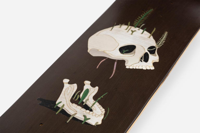 Old Skull Board 
Old Skull Board/ Life After Life Board è una tavola da skateboard decorativa,
disponibile in due varianti colore e con un disegno intarsiato simbolo della continuità
della vita dopo la morte.
Old Skull Board/Life After Life