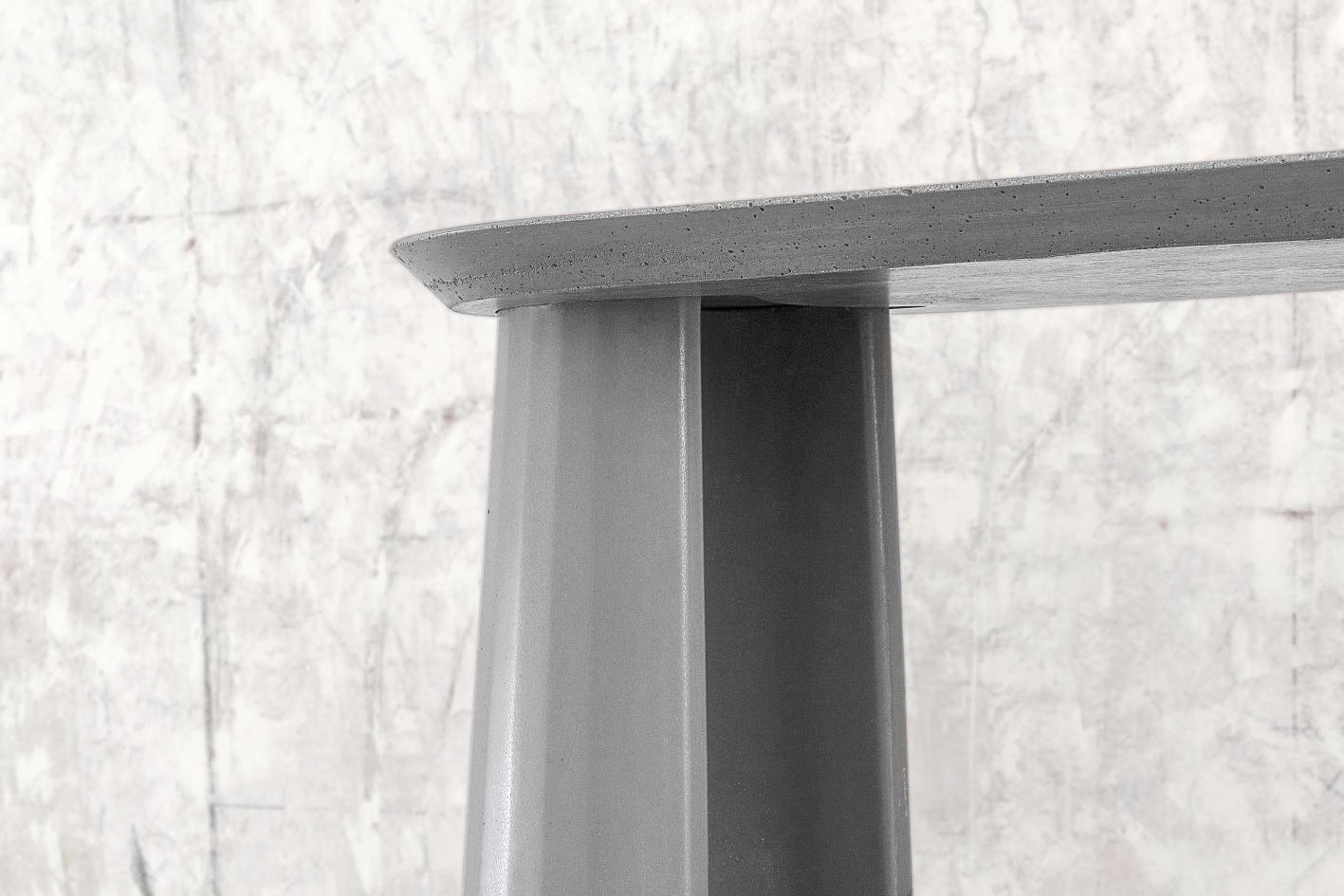 Console table part of a collection of modular system in ultra high performing cement mortar. UHPC shelves and abutment colored in the mixture and sandblasted. Available in eight different colors: Brick, silver, powder, cream, fir, dark, chocolate,