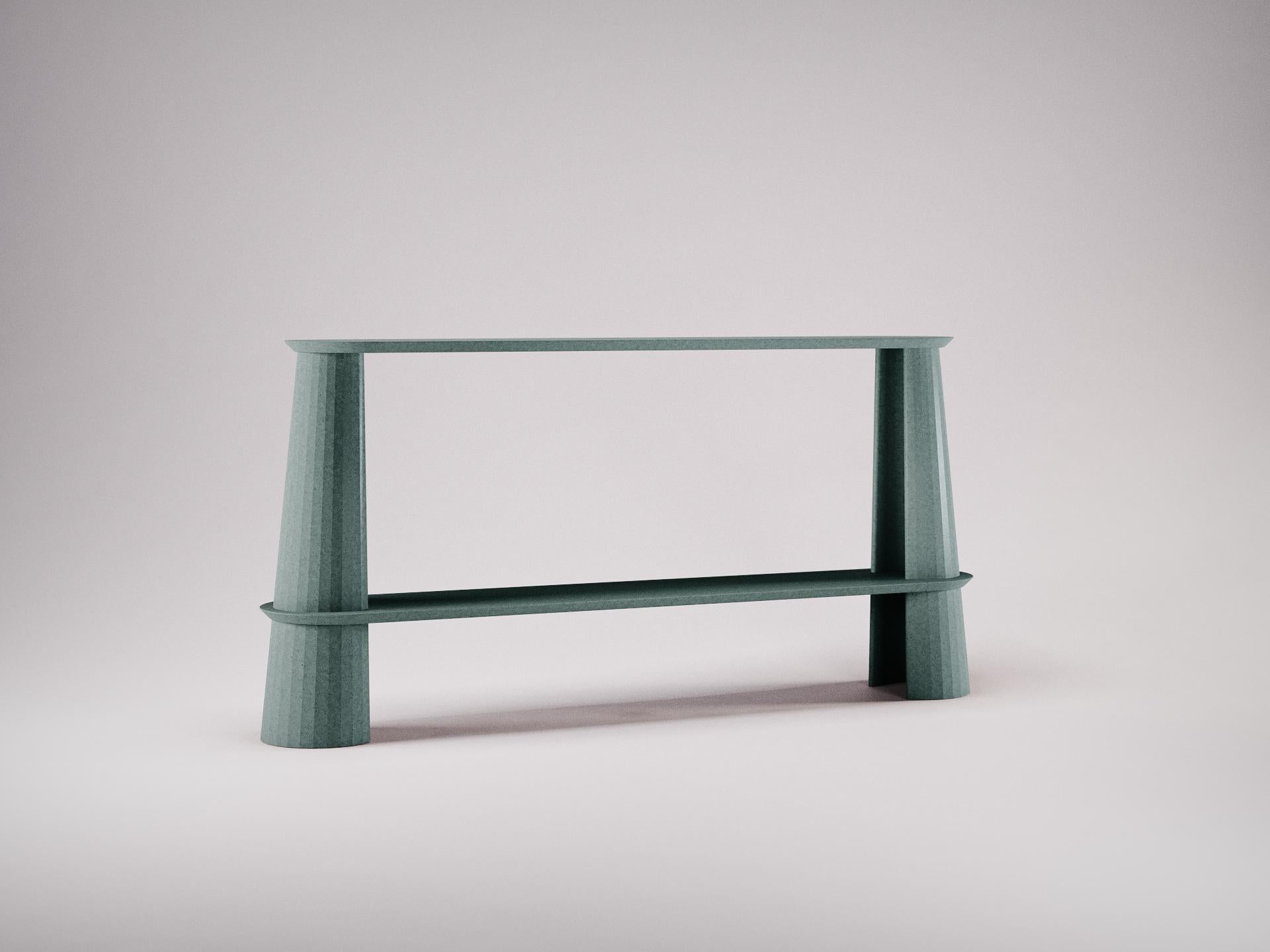 Console table part of a collection of modular system in ultra high performing cement mortar. UHPC shelves and abutment colored in the mixture and sandblasted. Available in eight different colors: Brick, silver, powder, cream, fir, dark, chocolate,