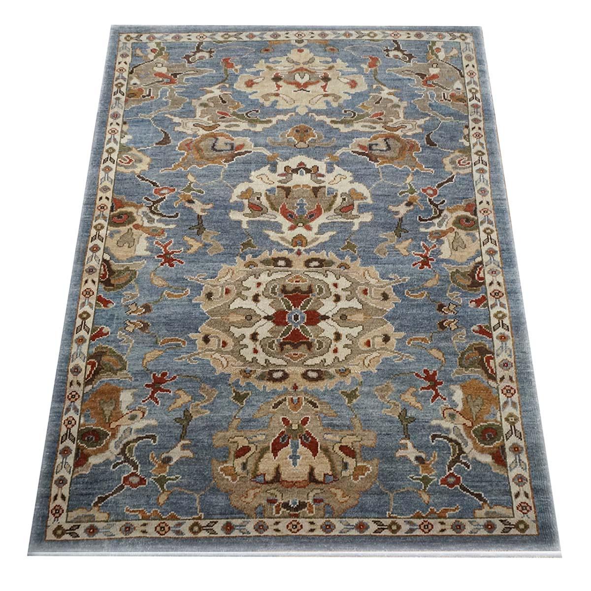 Ashly Fine Rugs presents an antique recreation of an original Persian Sultanabad 4x6 Slate Blue, Ivory, & Tan Handmade Area Rug. Part of our own previous production, this antique recreation was thought of and created in-house and 100% handmade in