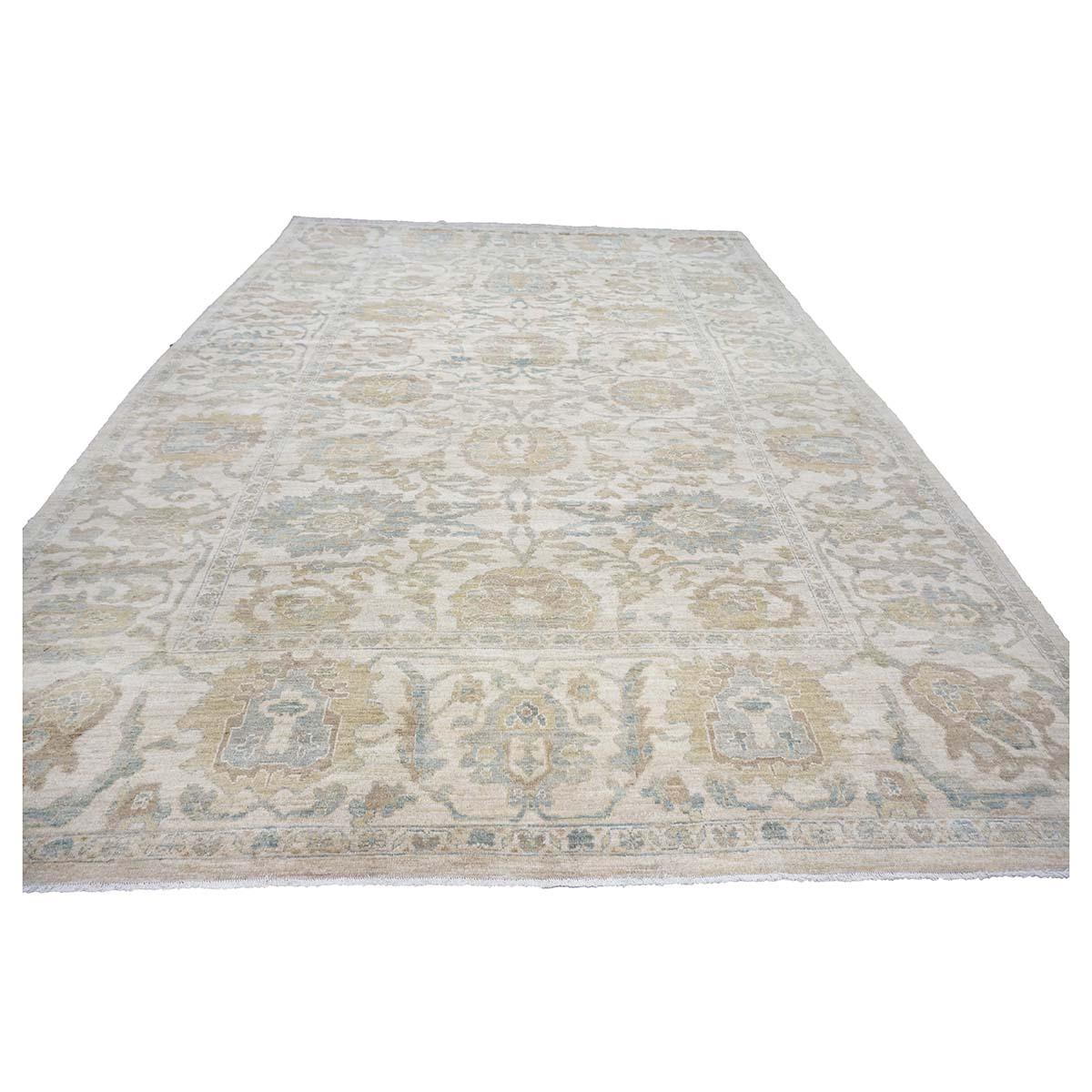 Ashly Fine rugs presents an antique recreation of an original Persian Sultanabad 10x14 Ivory Handmade Area Rug. Part of our own previous production, this antique recreation was thought of and created in-house and 100% handmade in Afghanistan by our