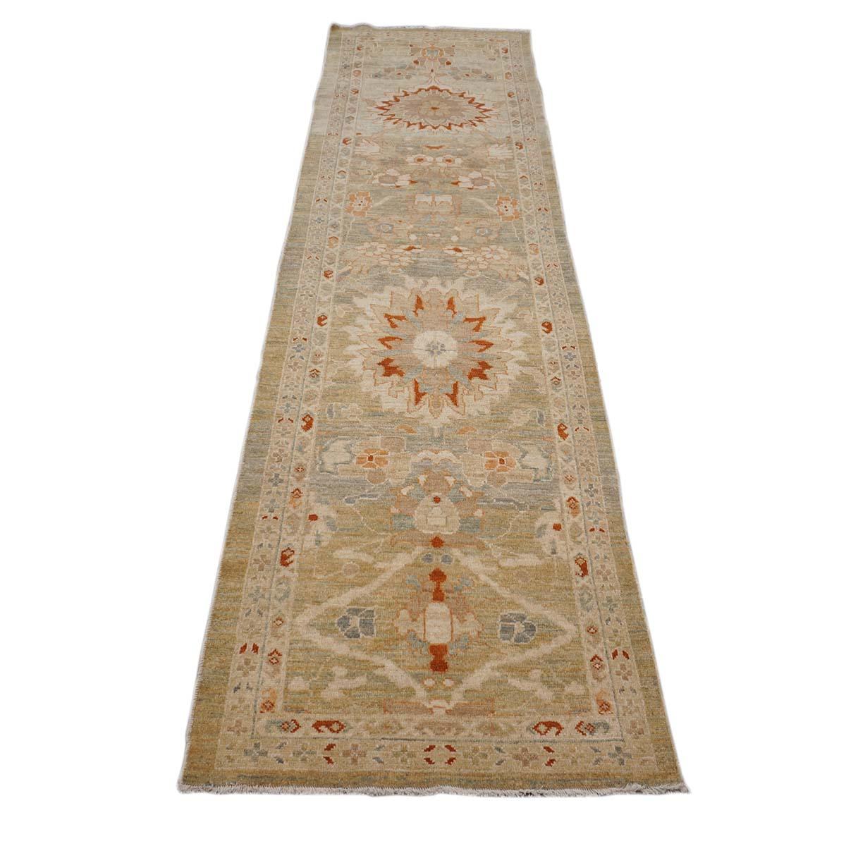 Ashly fine Rugs presents an antique recreation of an original Persian Sultanabad hall runner. Part of our own previous production, this antique recreation was thought of and created in-house and 100% handmade in Turkey by master weavers. Sultanabads