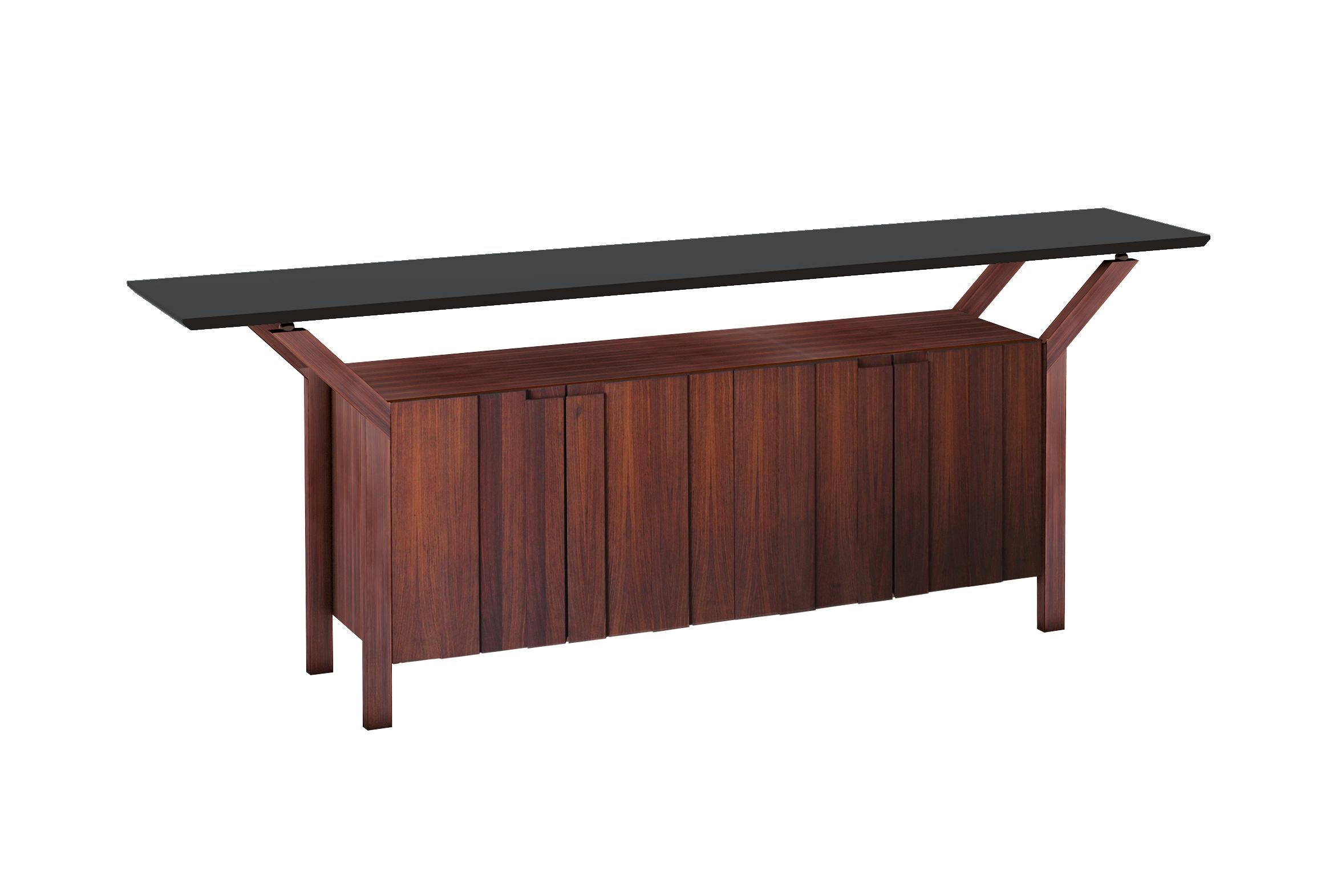 The Sweden sideboard, designed by architect Roberto Cappelli, blends traditional materials and new technologies for a clean, elegant design inspired by Swedish furniture of the 1950s and 1960s. The structure and containers are in Brazilian rosewood