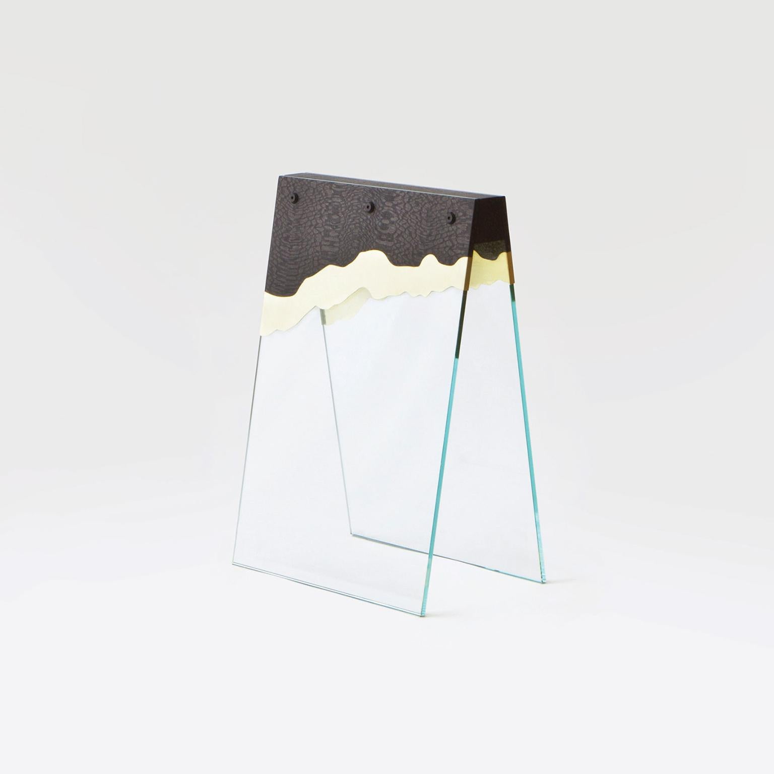 The table combines contrasting concepts and perspectives, with materials ranging from plastic laminates, brass, copper to ultra-white glass ingeniously mixed to reveal a harmonious combination of layers.

Each piece made by Atelier Biagetti is