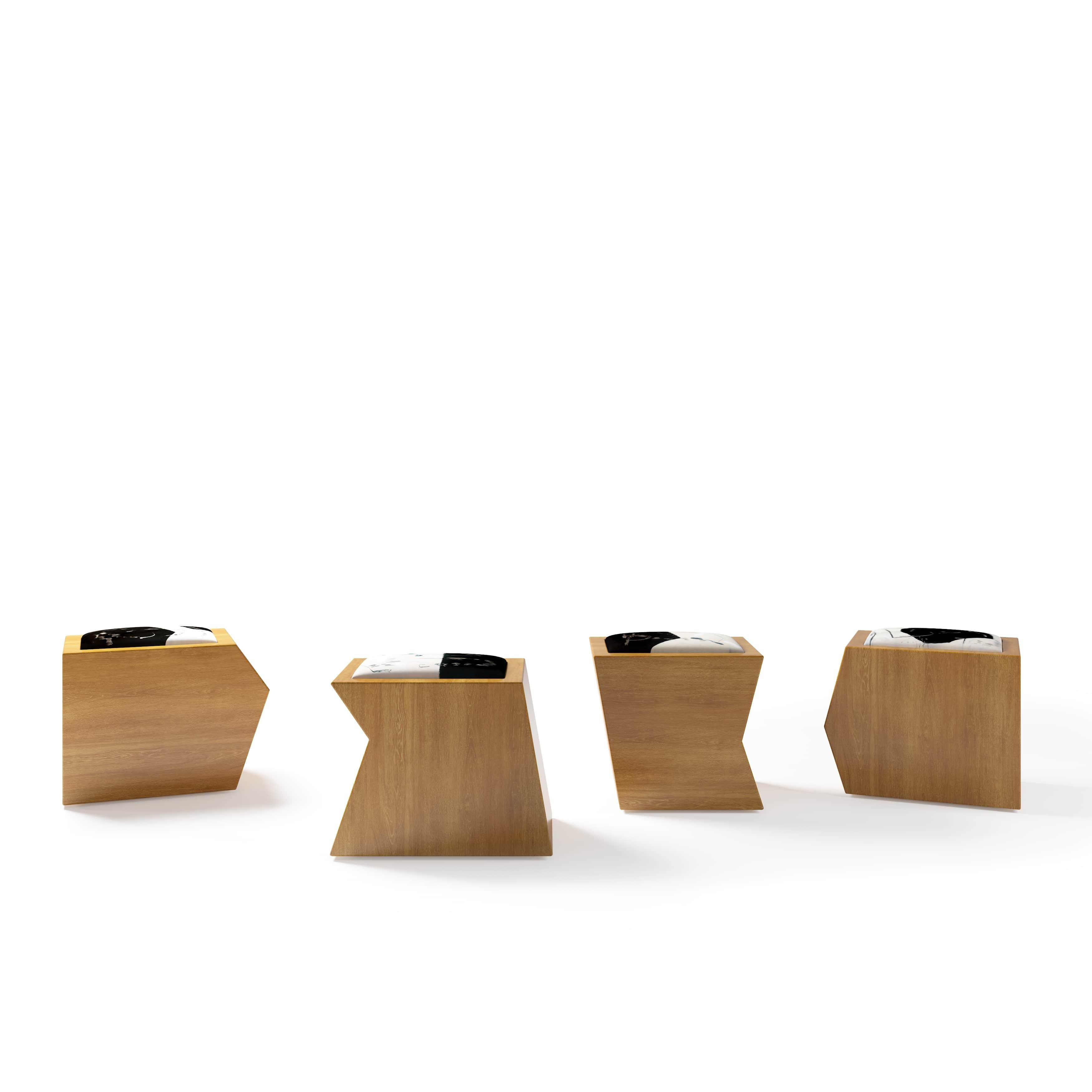 Tang is composed of the geometric lines of the Chinese puzzle game Tangram. Made of wood, the bench can become four single seats - due to its cuts and geometric shapes. Each seat features the paintings of the abstract artist Yuan-Wen Wang, reprised