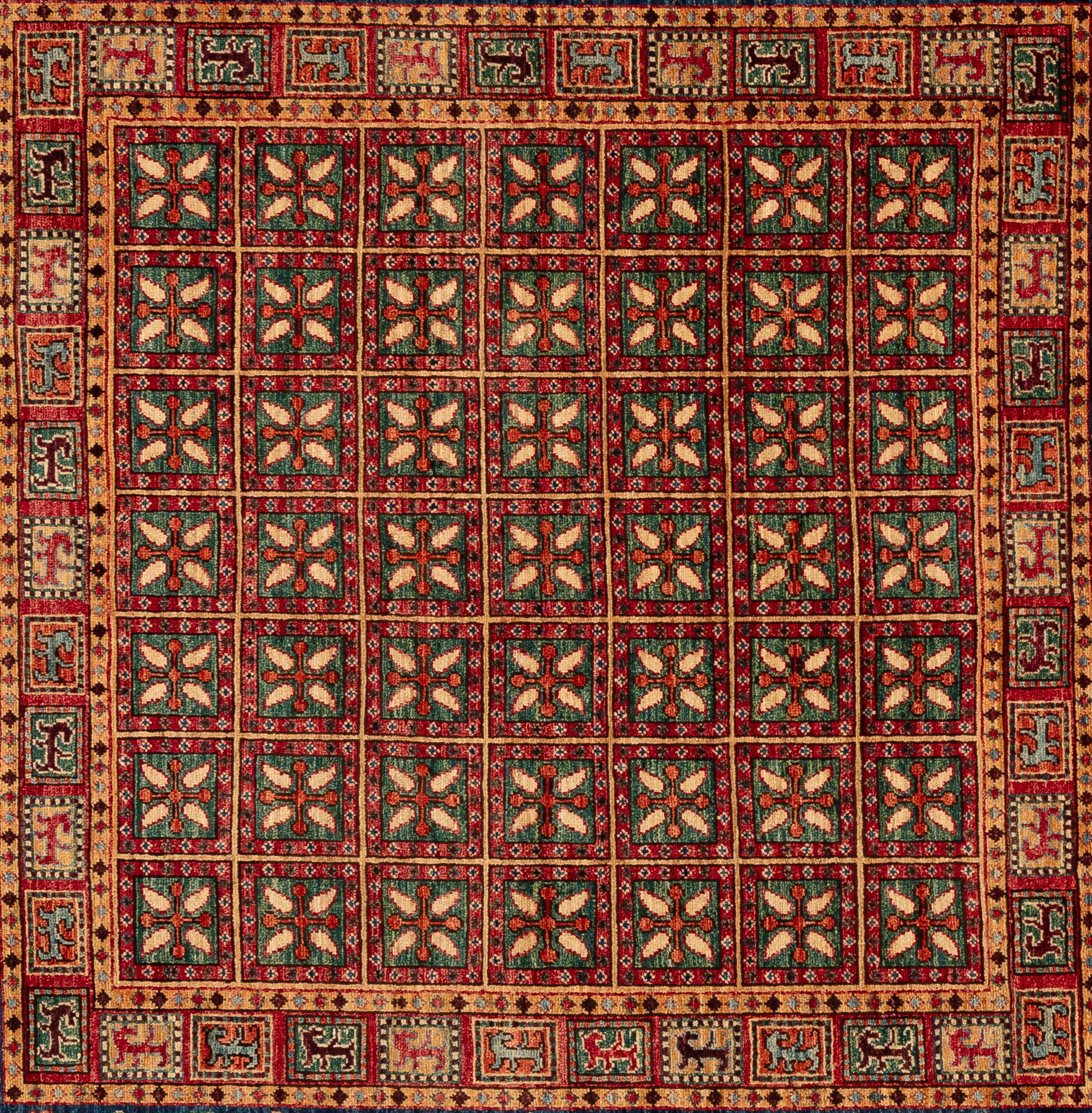 Ce superbe tapis tribal de l'Inde est un chef-d'œuvre vibrant fabriqué à partir de laine de haute qualité. Il présente des motifs complexes et des couleurs riches qui reflètent l'héritage culturel de la région. Chaque design/One tissé à la main