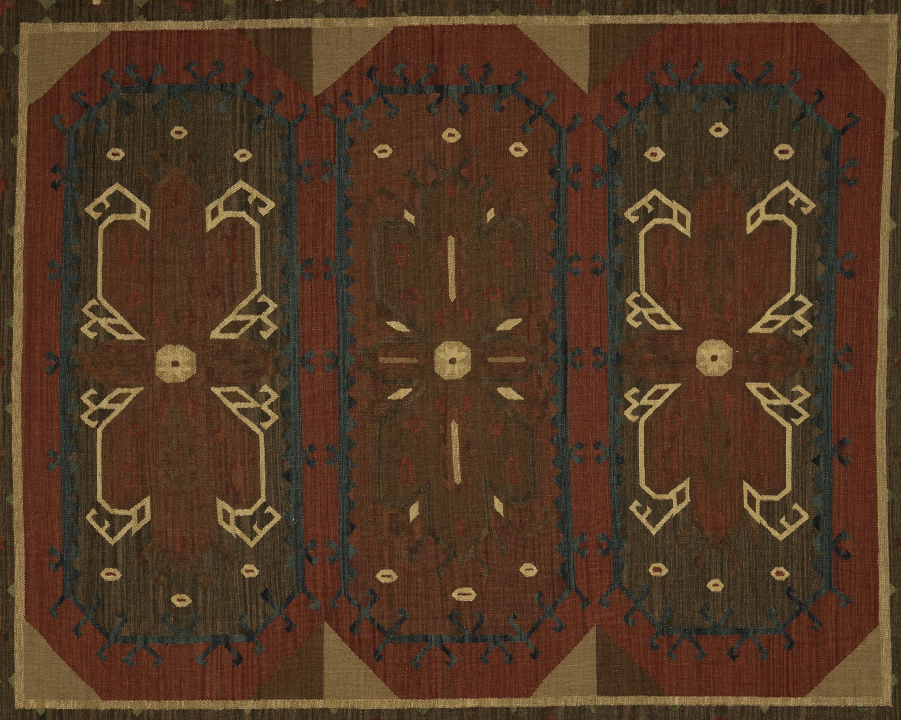 La meticolosa lavorazione artigianale e l'attenzione ai dettagli parlano della dedizione e dell'abilità degli artigiani che l'hanno portata alla luce. La lana utilizzata per creare questo tappeto kilim non solo gli conferisce una sensazione di