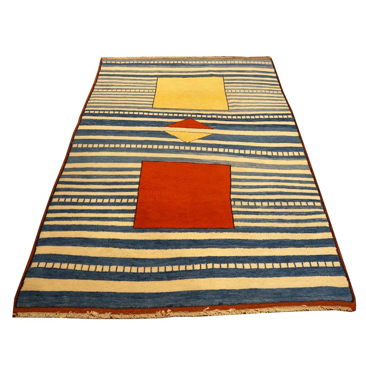 Ashly fine rugs presents a 21st-century Turkish Gabbeh 4x7 blue & ivory handmade Area rug. Gabbeh rugs were originally made by women from Qashgai tribes of south-western Persia and are known for their simple design, strong colors, and very thick and