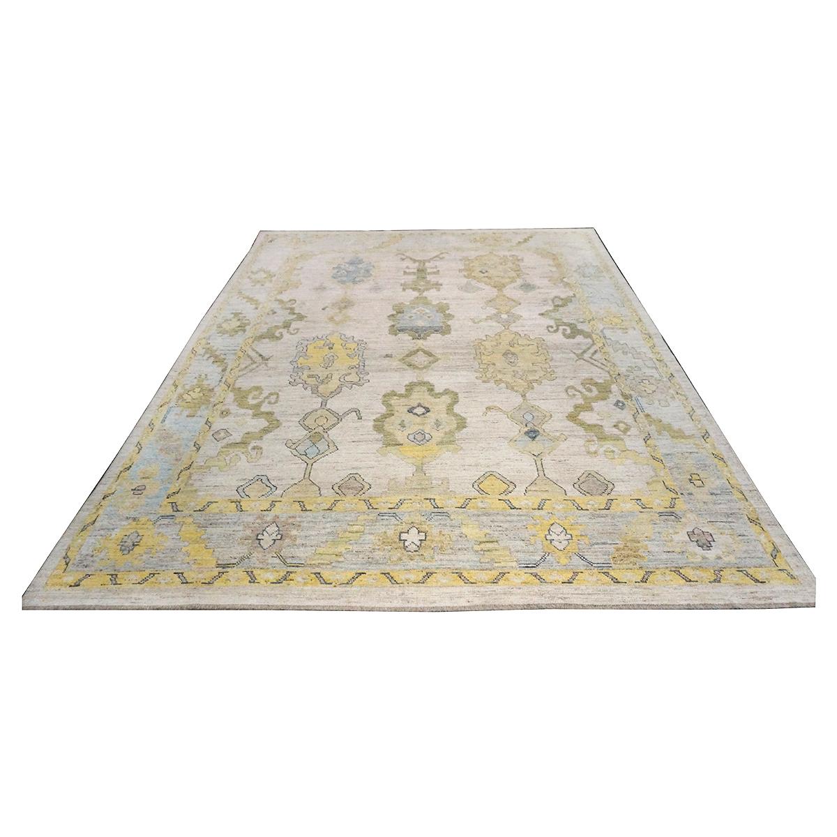   Ashly Fine Rugs presents a 21st-century Turkish Oushak 10x13 Handmade Area Rug. Oushak weavings began in a location just south of Istanbul, in a region that was to become the rugs namesake, Oushak. Although nomads first produced the rugs for