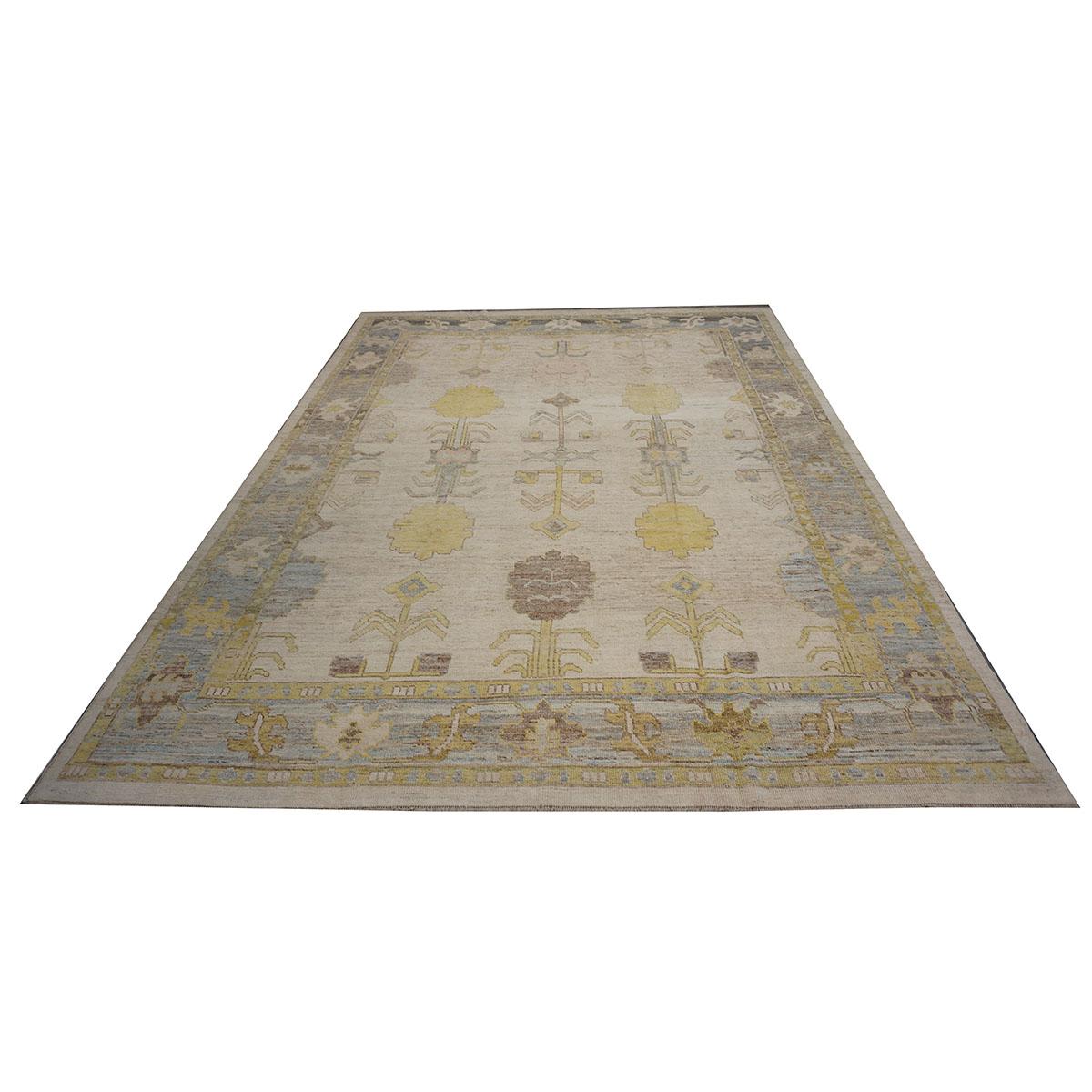 Ashly Fine rugs presents a 21st century Turkish Oushak 10x13. Oushak weavings began in a location just south of Istanbul, in a region that was to become the rugs namesake, Oushak. Although nomads first produced the rugs for personal use only, since