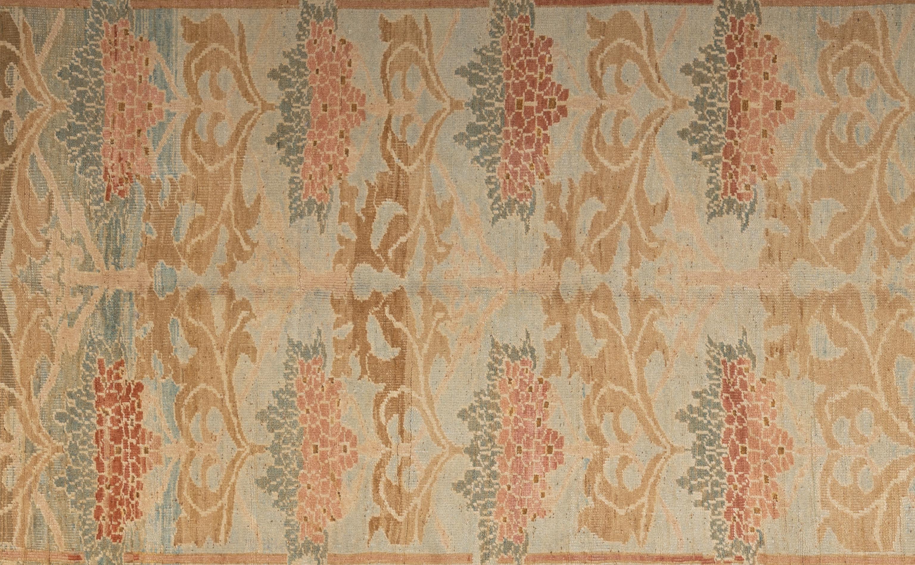 This exquisite Oushak rug is a true work of art skillfully handwoven by experienced artisans using traditional methods. Adorned with intricate patterns and a gentle color scheme crafted from natural vegetable dyes, this rug, is a striking focal