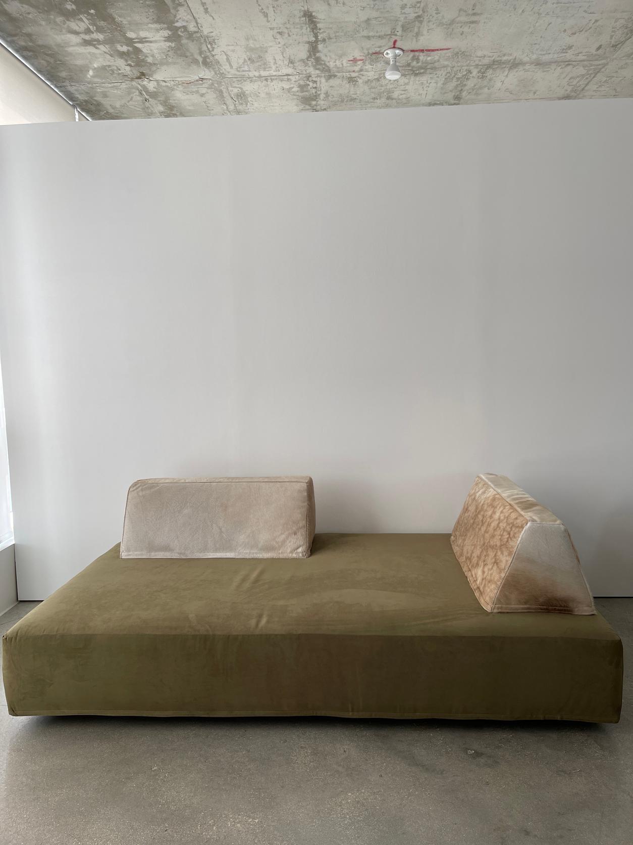 21st century velvet and cowhide daybed sofa with a soft beautiful olive color and a Texan Cowhide with neutral shades of color. Cowhide back rests are moveable and weighted to help from slipping. Gold Velvet sofa sold separately in the exact same
