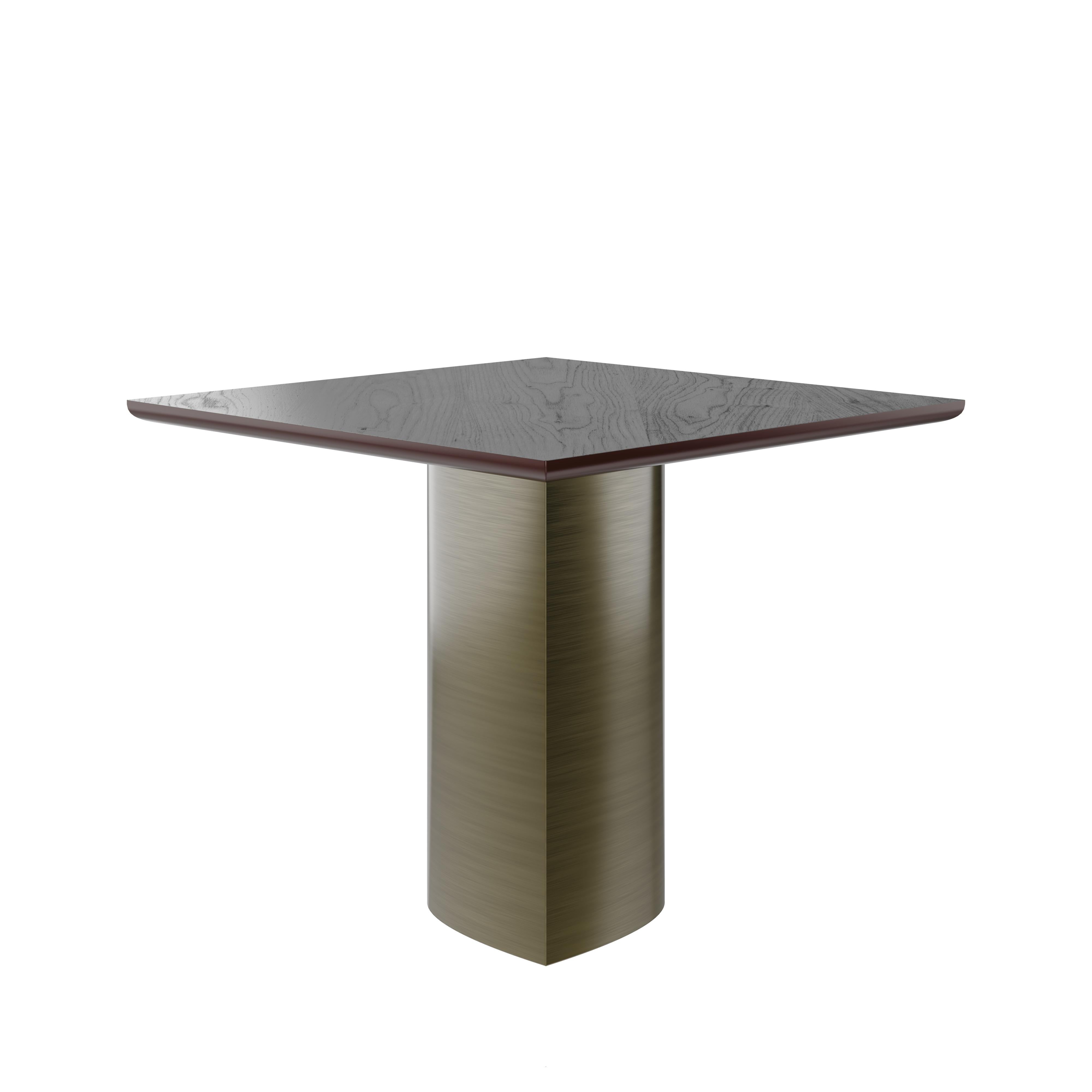 With the serene beauty of Vermont as its inspiration, Porus Studio designers conceived this square dining table as a tribute to the organic elegance and timeless charm of the state. Crafted from the finest materials, it reflects the tranquil