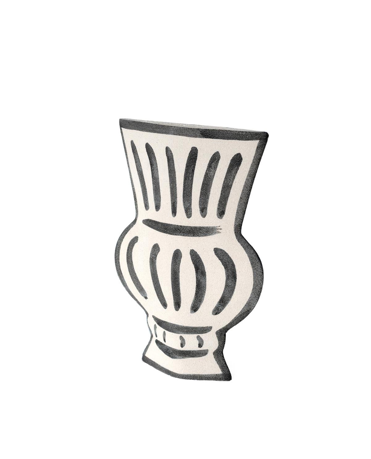 A part of a captivating new line blending ancient Greek pottery with contemporary design, the ‘Volute’ vase showcases delicate black underglaze illustrations that harmonize traditional and modern aesthetics.
Crafted by our designer, the black