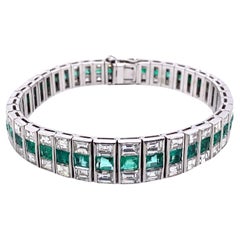 21st Century White Gold F/G-VVS Diamond and Emerald Tennis Bracelet