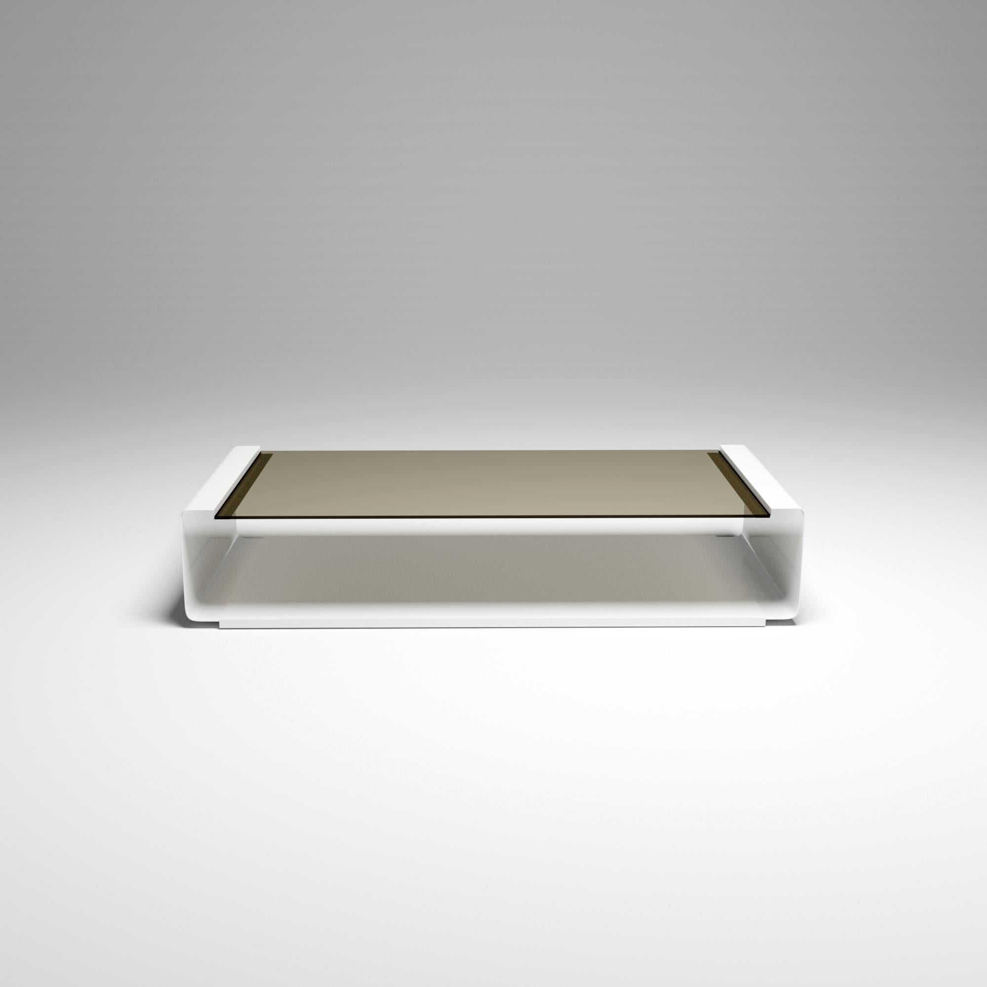 A modern embellishment of the style of François Monnet during the period of 1960 to 1970, the classic stainless steel frame is thermolaquered in white, and finished with a smoked bronze tempered glass table surface. Unique side detail elements