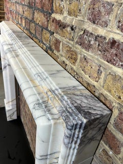 21st Century White Marble Breche Bolection & Nero Marquina Marble Fireplaces