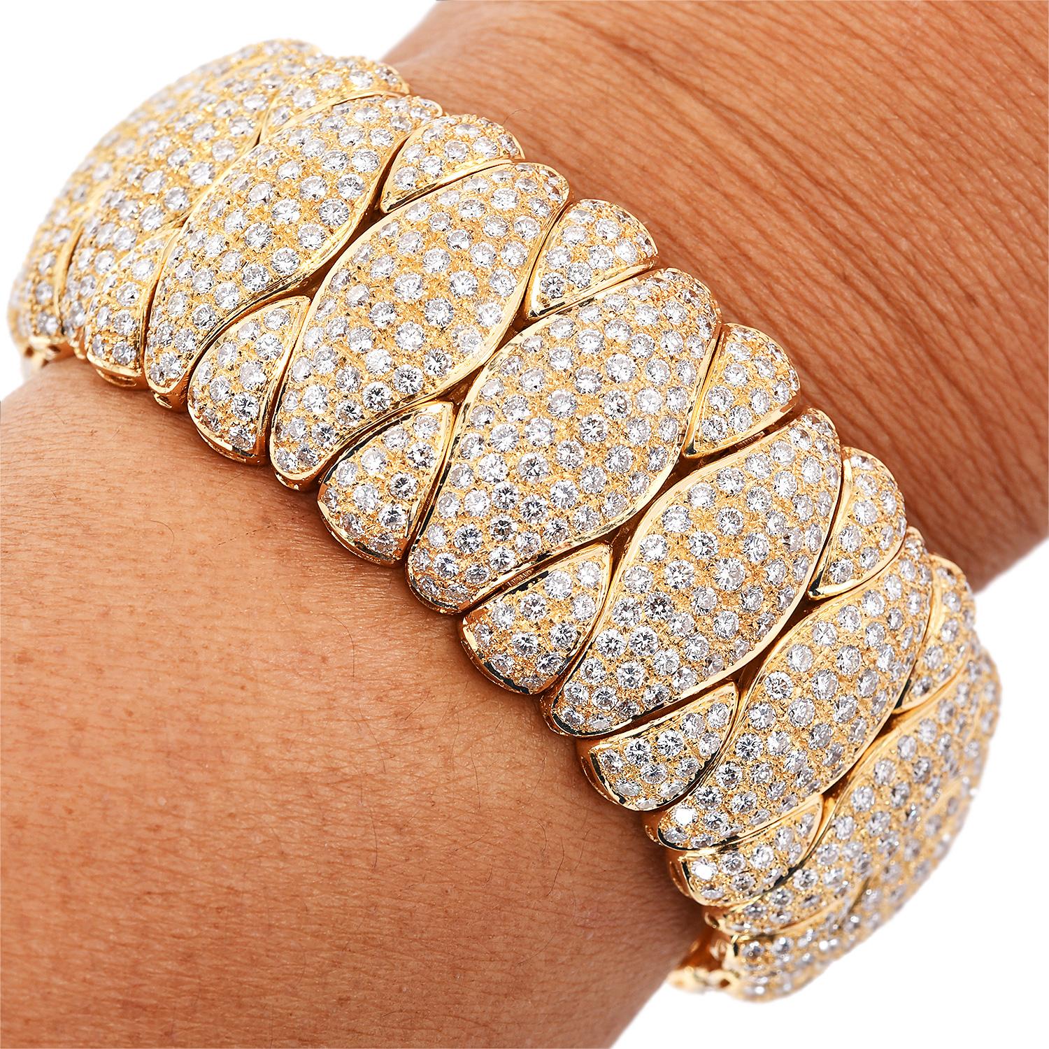 21st Century wide cuff statement bracelet forged in 18K yellow gold with natural round diamonds.

The bracelet is decorated with precious natural round diamonds Pave set in a beautiful design Pattern. 

The bracelet has an open