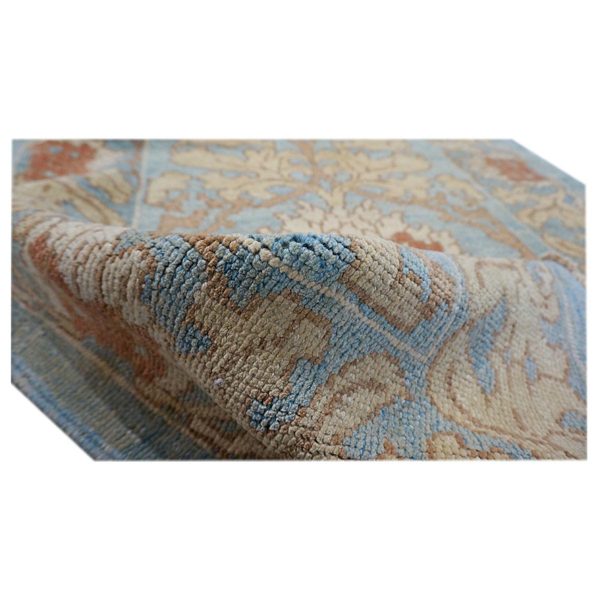 21st Century William Morris Donegal Carpet 4.4x5.7 Light Blue, Tan, & Rust In Good Condition For Sale In Houston, TX