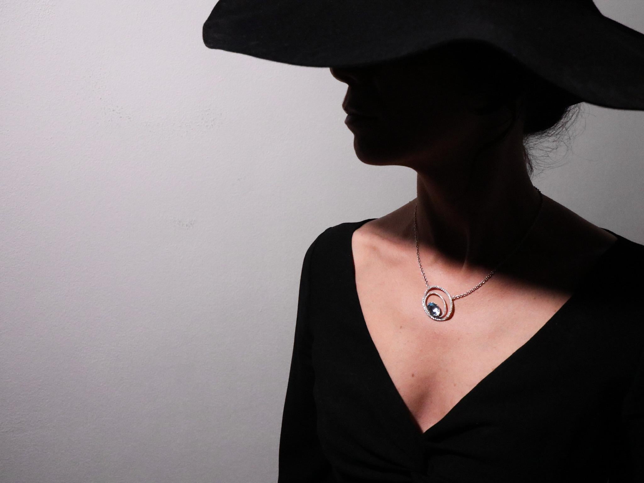 18K Gold Made in Italy Aquamarine Diamond Asymmetrical Cosmic Empowering Pendant.
Enlighten your Beauty with the Saturno Pendant Necklace.
Unlock Your Divine Potential with the Saturno pendant. 
Gems and metal are energetically cleansed to emit