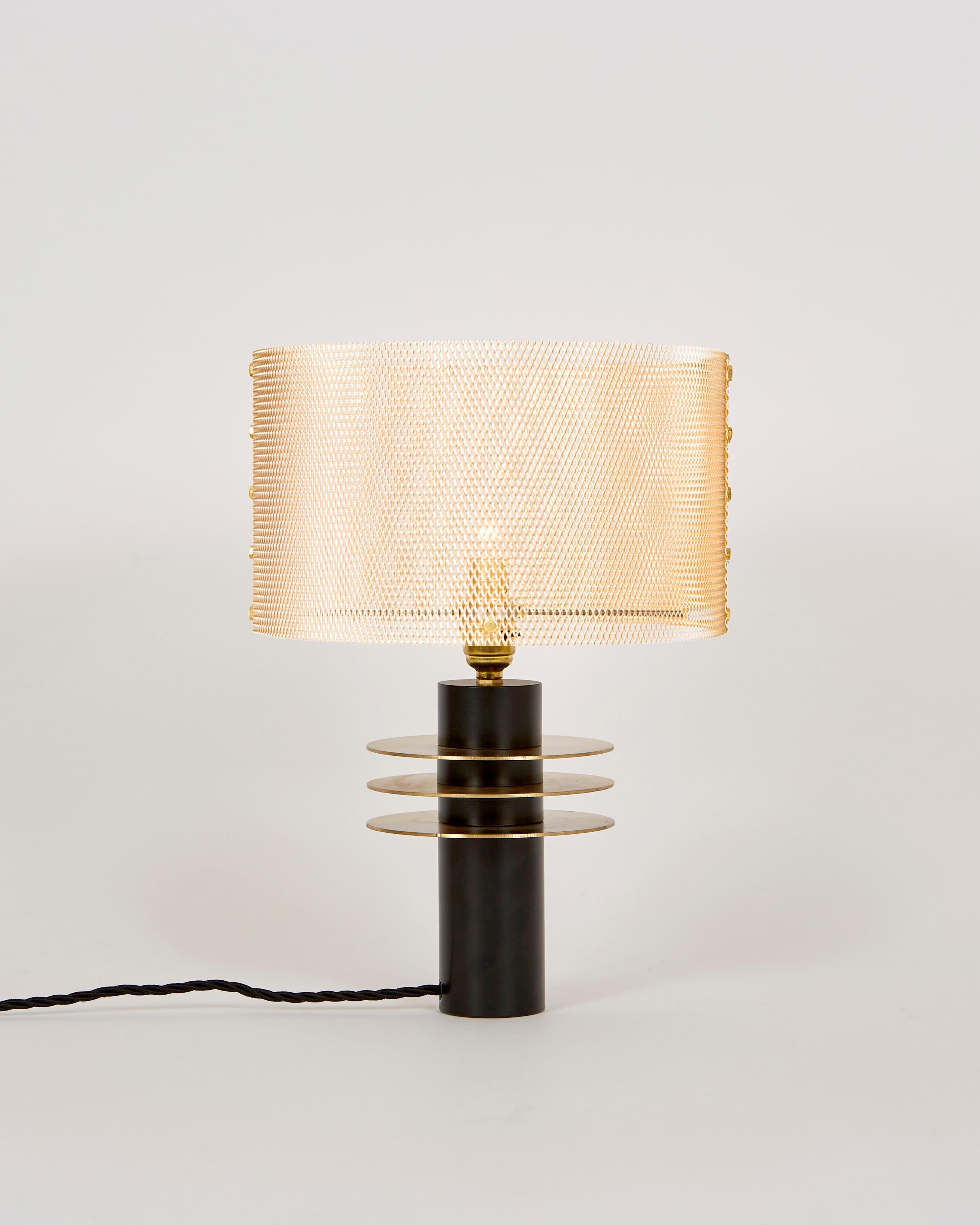 Expanded metal has become a recognizable trademark of Studio Marine Breynaert. The shades form a regular lace. Light lives through the mesh, it is not frozen, it moves and draws changing shadows.
These lamps are suitable for lighting a living room,