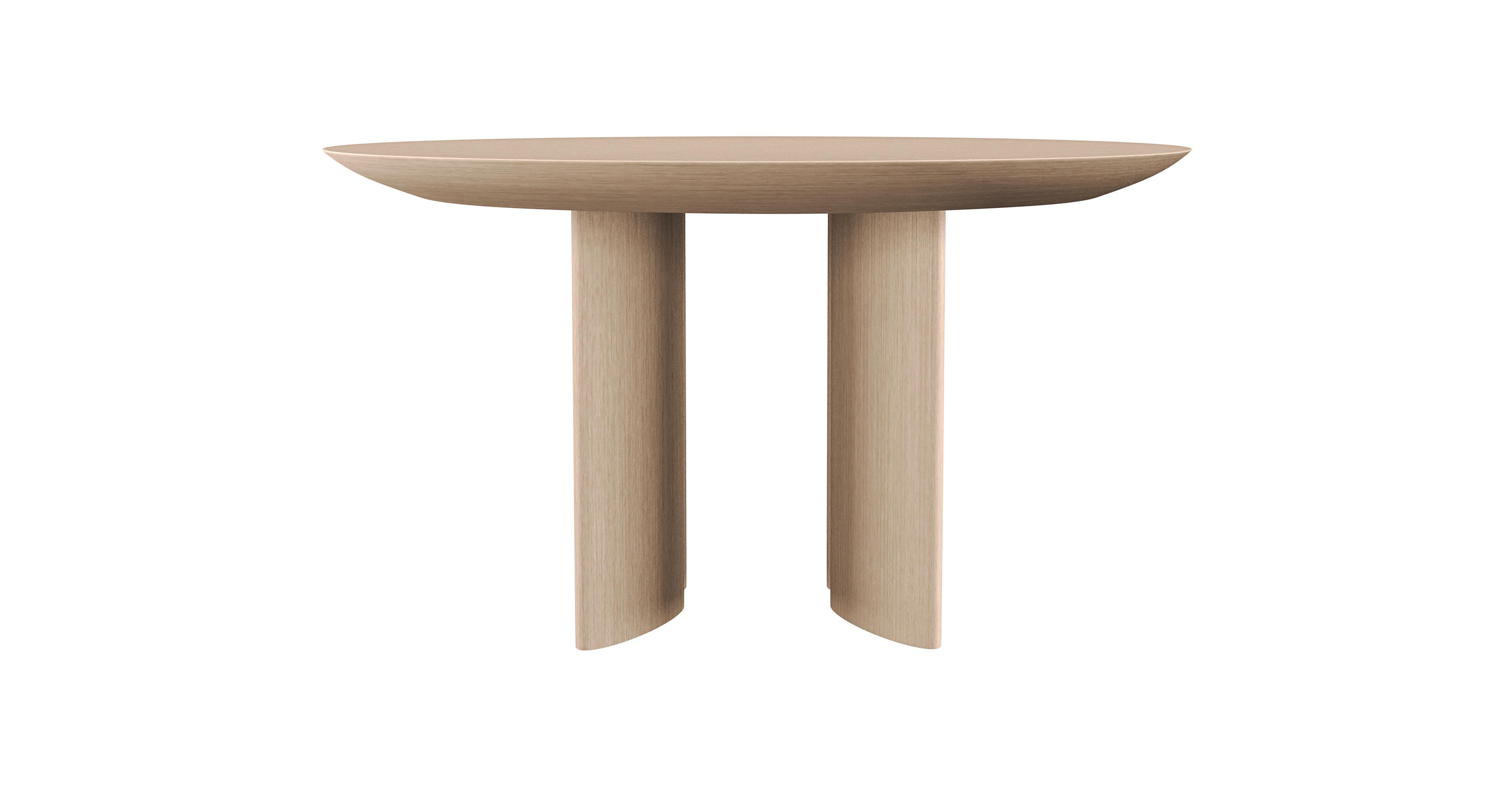 TORII

Inspired by the Japanese sacred portals of the same name, Torii is a solid wood table veneered in bleached oak. Handmade in Italy. 

It represents a modern transition between the sacred and the profane: the sacredness of conviviality at the