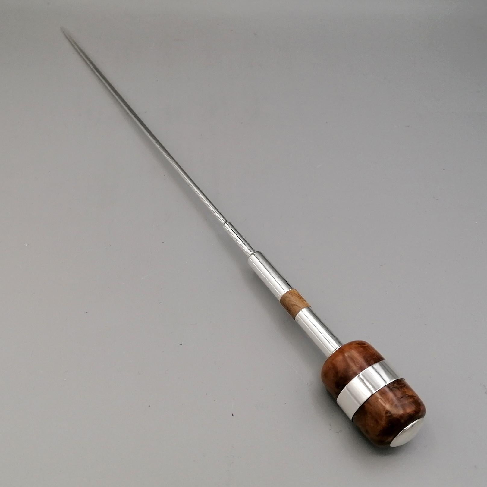 21th Century Italian sterling silver and wood conductor' baton.
Conductor's baton in sterling silver with wood inlays.
The wand is completely handmade starting from the silver plate.
The barrel of the baton is hollow and lightweight, suitable for