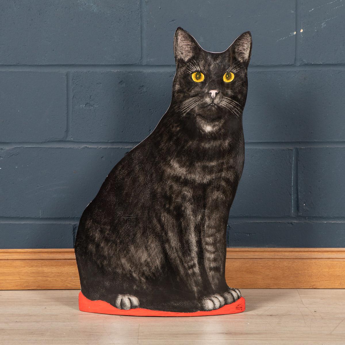An umbrella stand in the form of a cat by Fornasetti, made in Italy around 2007. Nicknamed 'Micione' (or large pussy cat), this stand is dates 2007, made from silkscreen and painted metal. Numbered and dated 'N.2 2007' to the lower right, with a