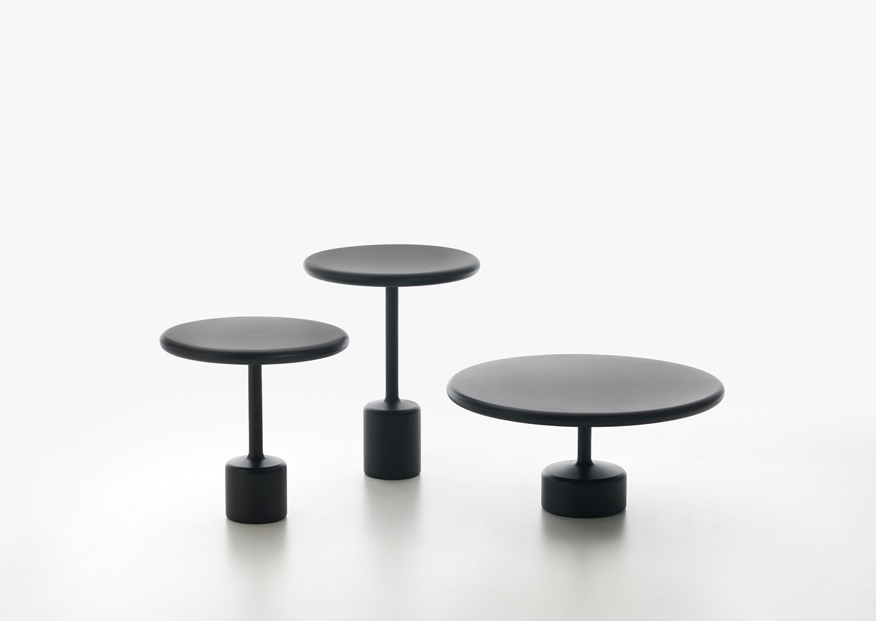 Tavolotto is a set of 3 tables - same look, different proportions. Dide table, center low table, accessory table. Tavolotto appears monolithic, almost as if it were made of a single block, though it is not. It is welded, then polished so perfectly