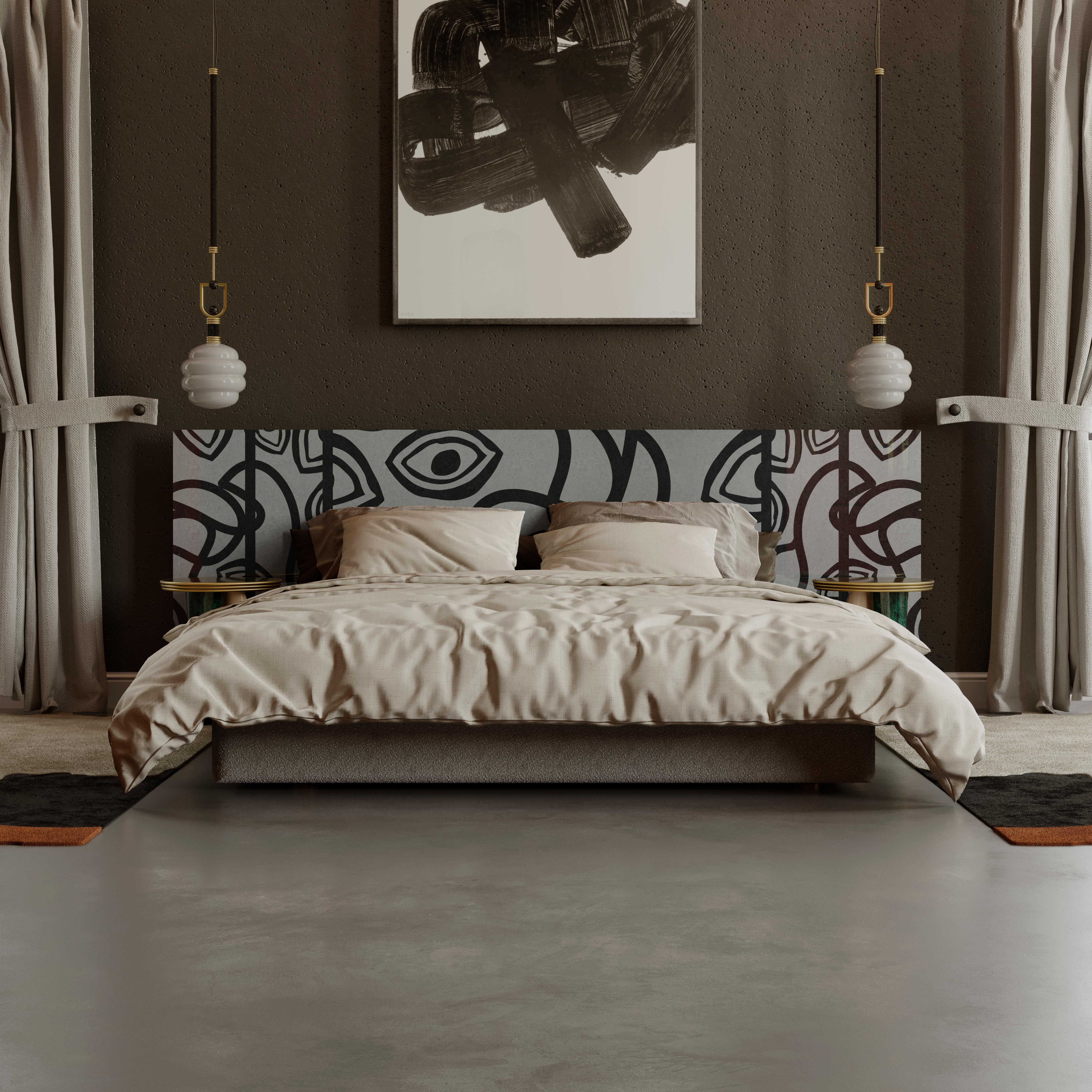 Ruiz Bed is meticulously hand-crafted and boldly adorned with a modern marquetry pattern. Its dynamic, cubist pattern is ideal for minimalist or mid-century modern bedrooms. This captivating and modern bed is exquisitely designed. It features a