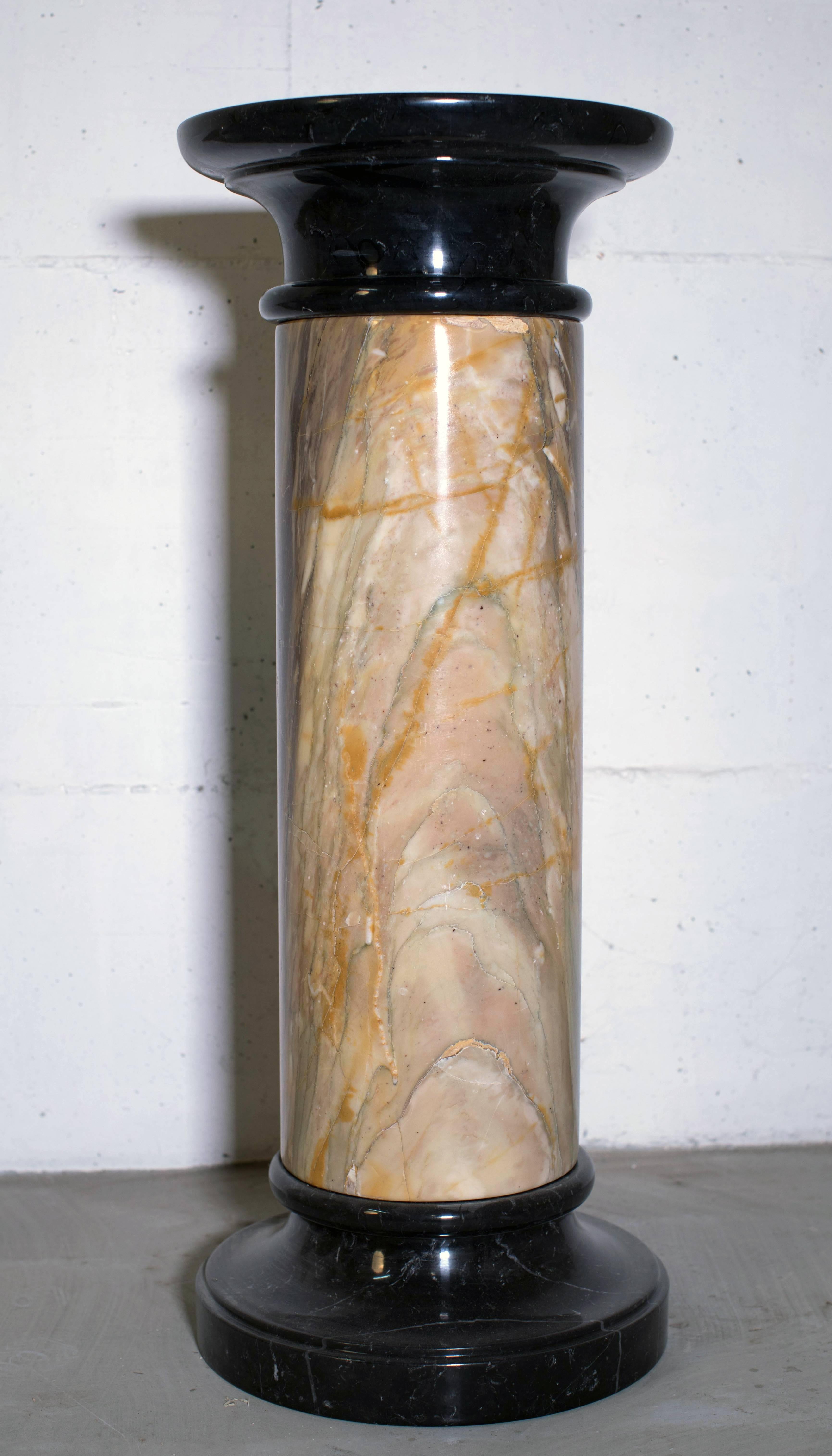 A superb and really block of Siena marble block, were used to make this column with the basement and the capital in black marble. Carved and finished by the hand of Italian sculptor artist is made in the respect of the classical proportion and an