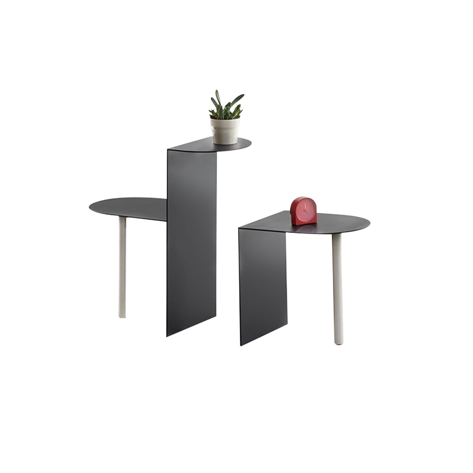 Piatto is a family of tables made from solid steel plate; despite the material, however, the objects look light. The range includes small side tables, large coffee tables, and tall display tables. Piatto tables are perhaps familiar – the angles,