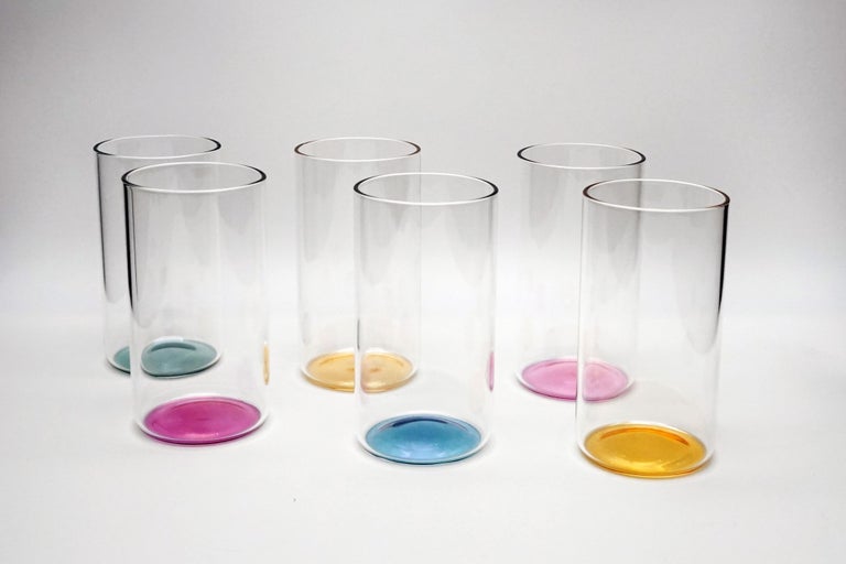 Set of 6 shot glass.
Dimensions of each glass : Ø7 x H12,5 cm
The “Iride” glass exploit the phenomenon of light refraction and play with the bottom color, transporting it to the surface. Iride is made for the water, perfect liquid for the