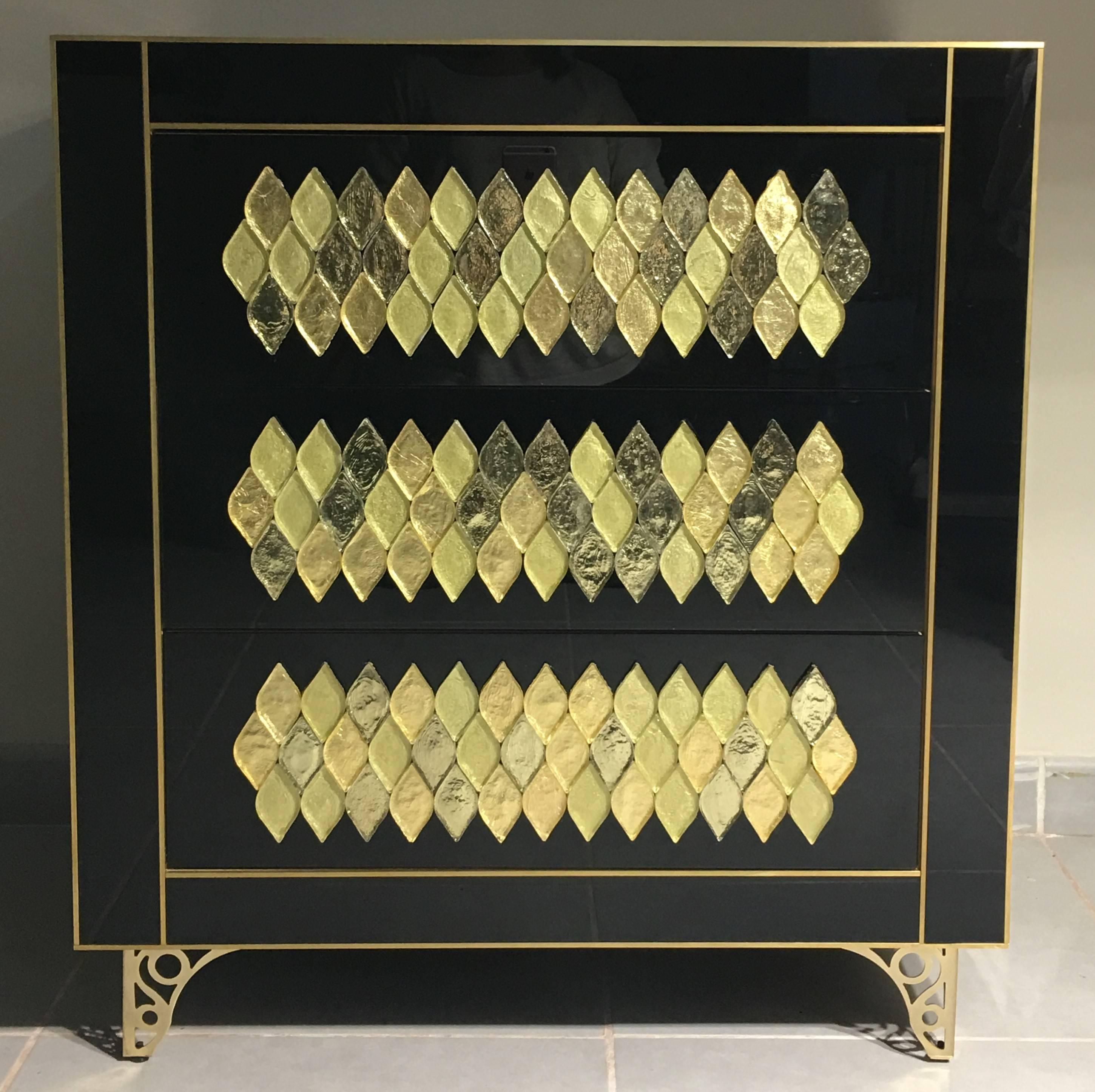 21th handmade mirrored commode or chest of drawers in Murano glass and brass inlay with three drawers
The chest are made of wood covered with colored little bit Murano glass and push system hardware for open the drawers for more comfort in