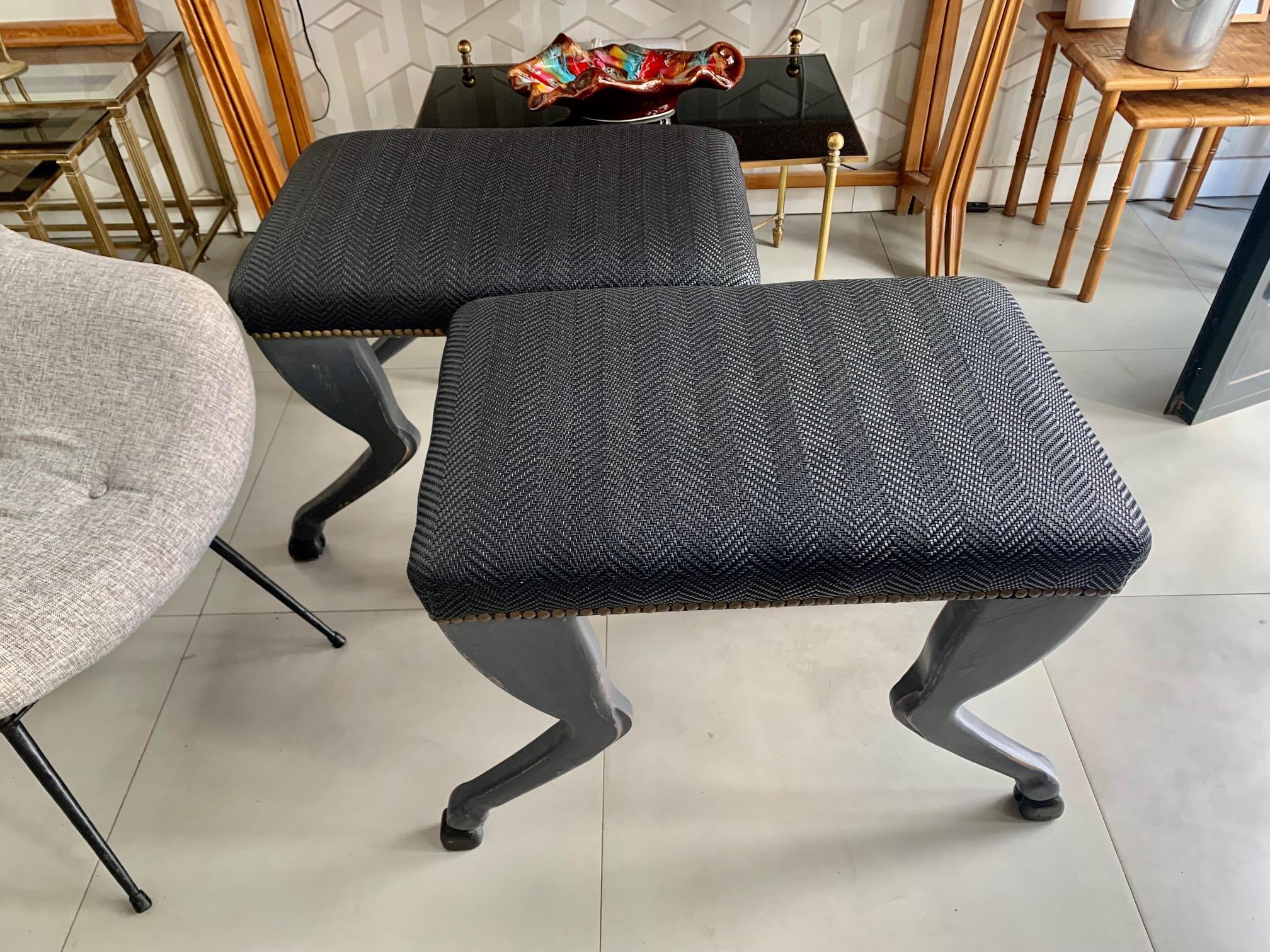 Pair of benches made by order by our cabinetmaker, in treated beech wood, manually carved imitating the legs of a horse, also painted by hand and patinated, in this case in dark gray and the hooves in black, the upholstery also in a color black with