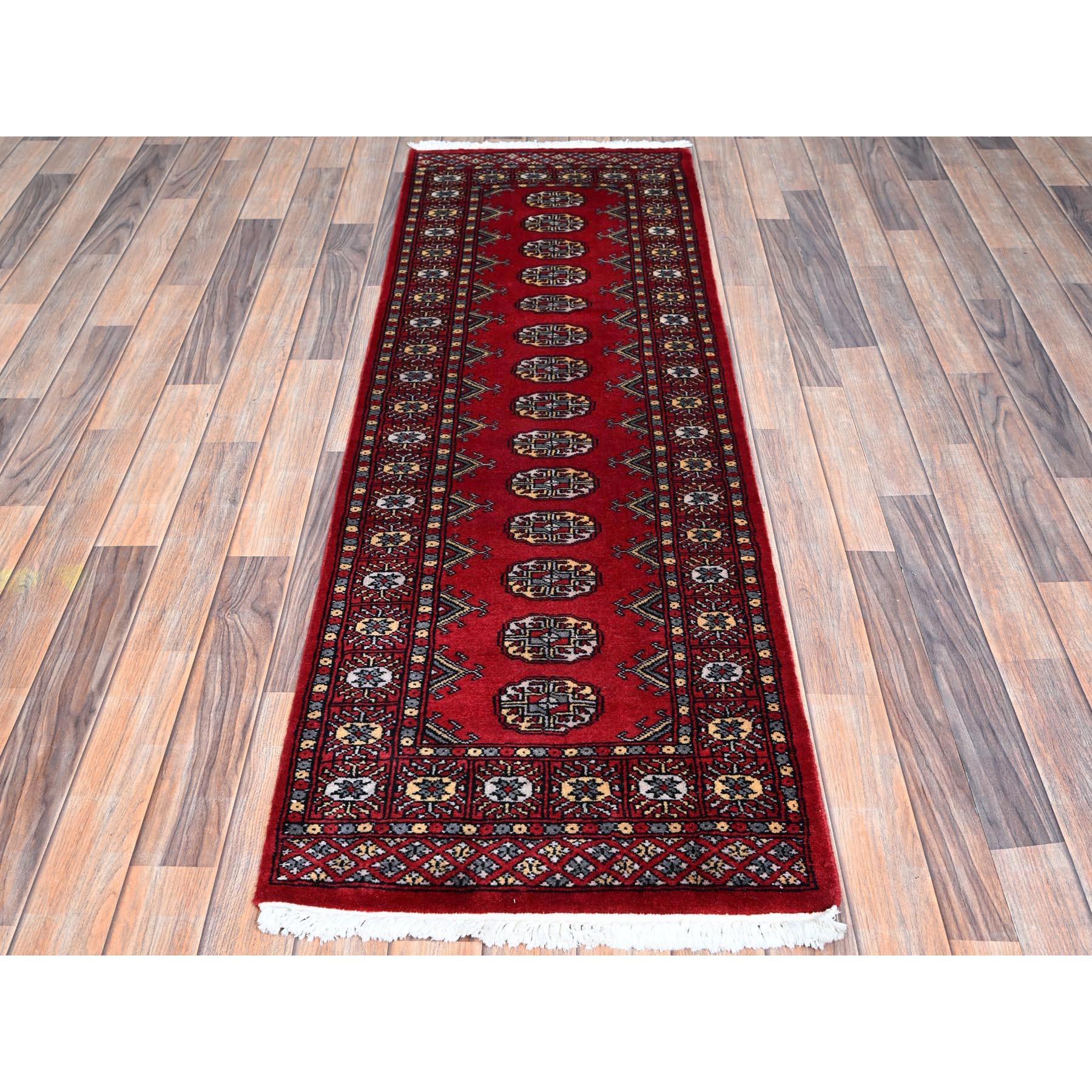 Ajax Red, Princess Bokara with Tribal Medallions, Natural Dyes, 100% Wool, Hand Knotted, Runner, Oriental Rug
Primary materials: Wool
Latex: No Pile 
height: 0.25 Inches
Style: Traditional
Primary color: Red
Secondary colors: Gray, Beige,