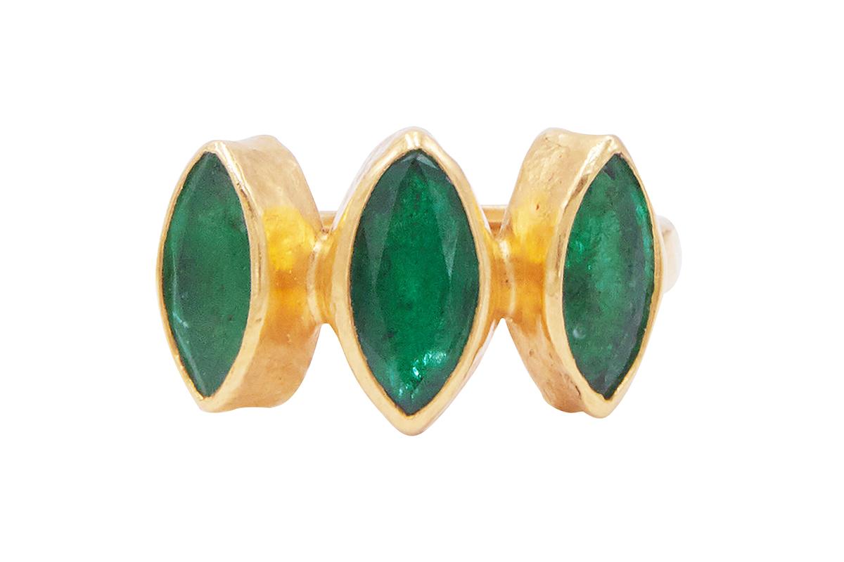 GURHAN one-of-a-kind band ring set in 24 Karat hammered yellow gold featuring (3) 10x5mm marquise shaped faceted Emeralds, 3.20 cts. Bezel stone setting, 22 Karat hammered yellow gold shank. Size 6.5.