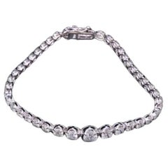 Important bracelet tennis avec diamants gradués et paillettes magnifiques, 22 500 18 carats