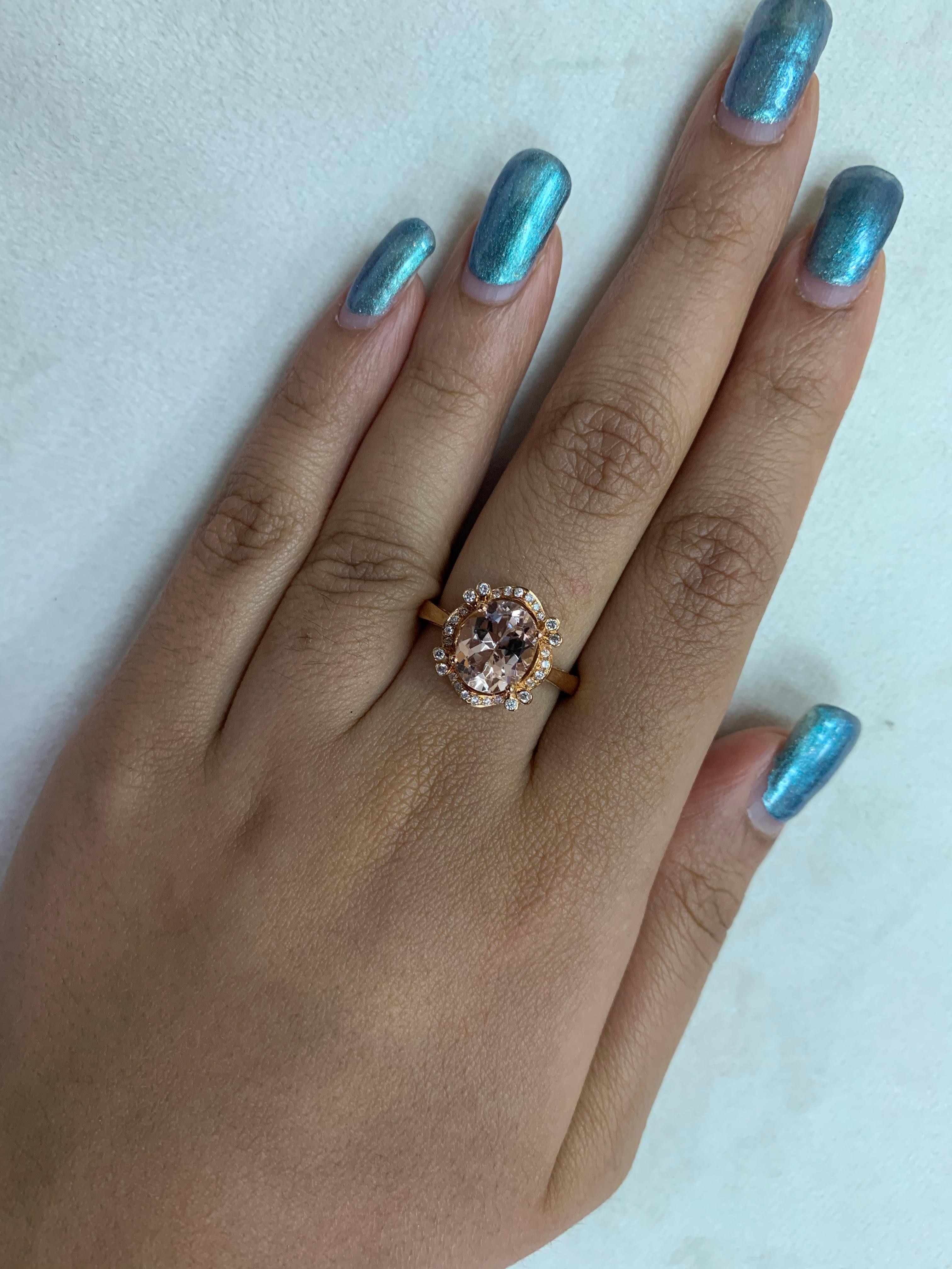 This collection features an array of magnificent morganites! Accented with diamonds these rings are made in rose gold and present a classic yet elegant look. 

Classic morganite ring in 18K rose gold with diamonds. 

Morganite: 2.21 carat oval