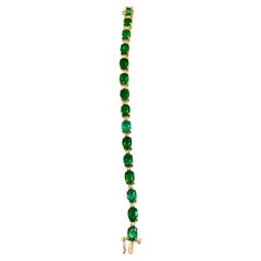 Bracciale tennis con smeraldo brasiliano naturale da 22 carati e diamanti in oro giallo 14 Kt