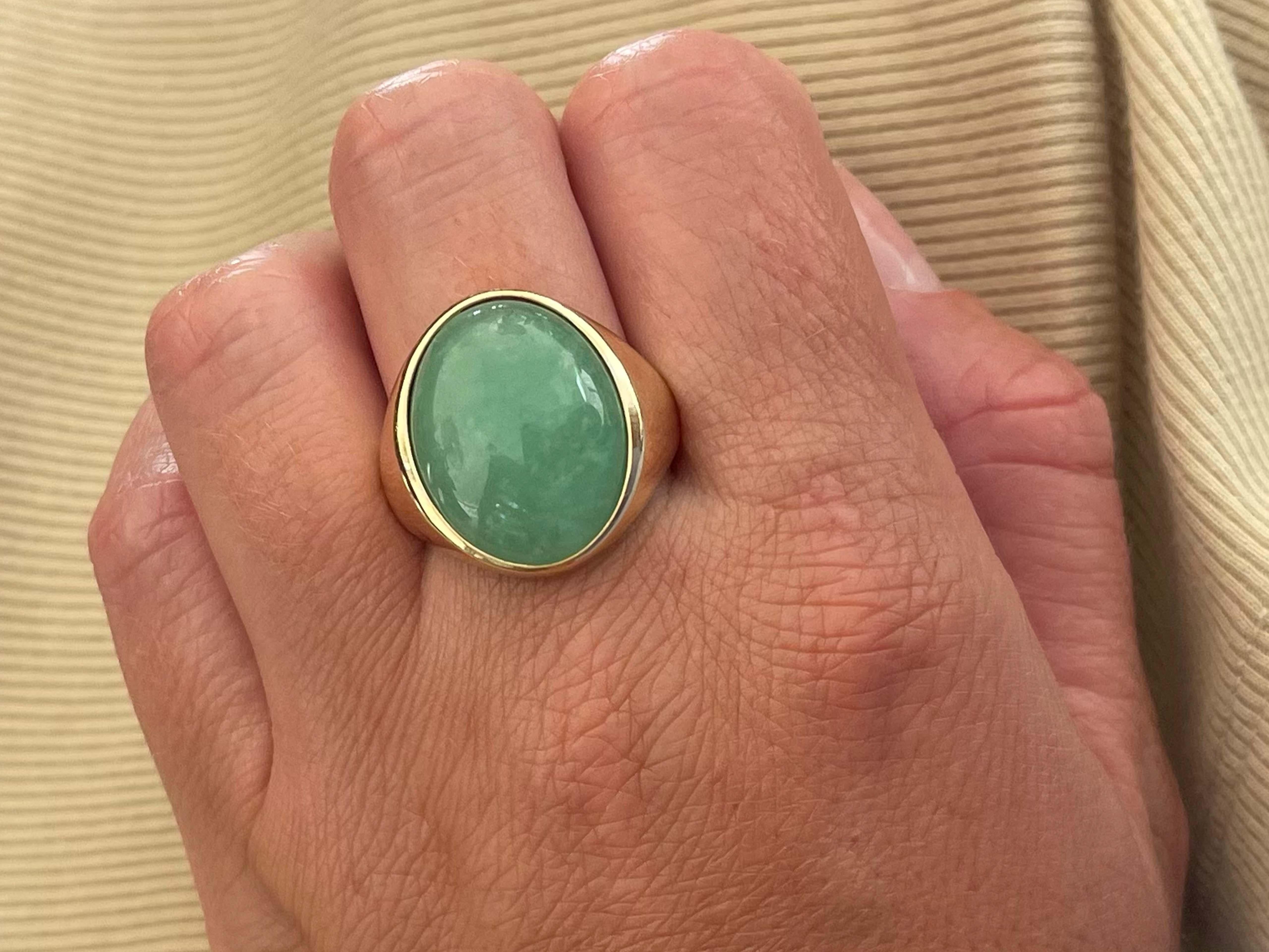 Item Specifications:

Metal: 14k Yellow Gold 

Style: Statement Ring

Ring Size: 10.5 (resizing available for a fee)

Total Weight: 10.6 Grams

Gemstone Specifications:

Center Gemstone: Jadeite Jade

Shape: Oval

Color: Green

Cut: Cabochon

Jade