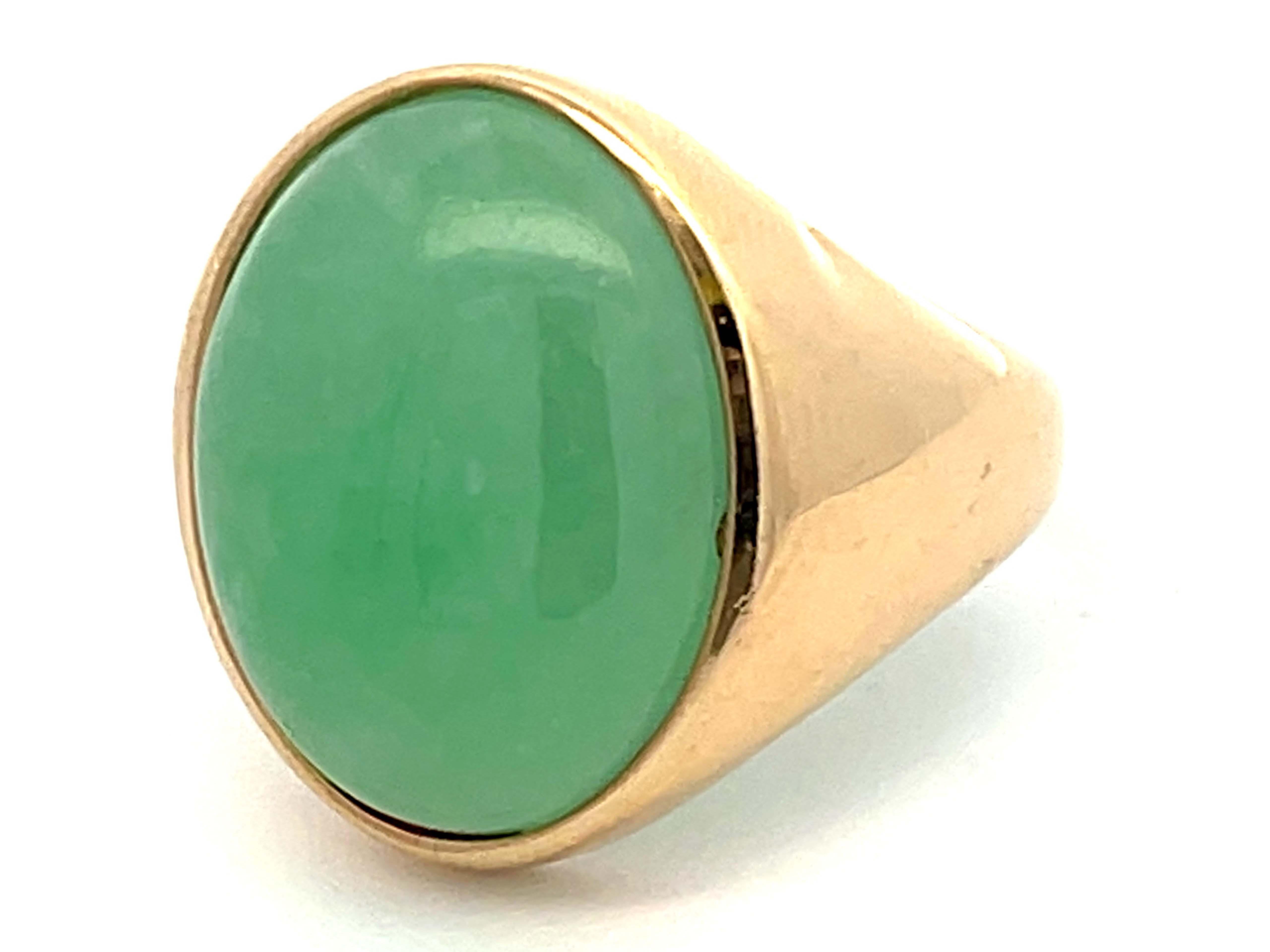 Modern 22 Carat Oval Cabochon Green Jade Ring in 14k Yellow Gold For Sale