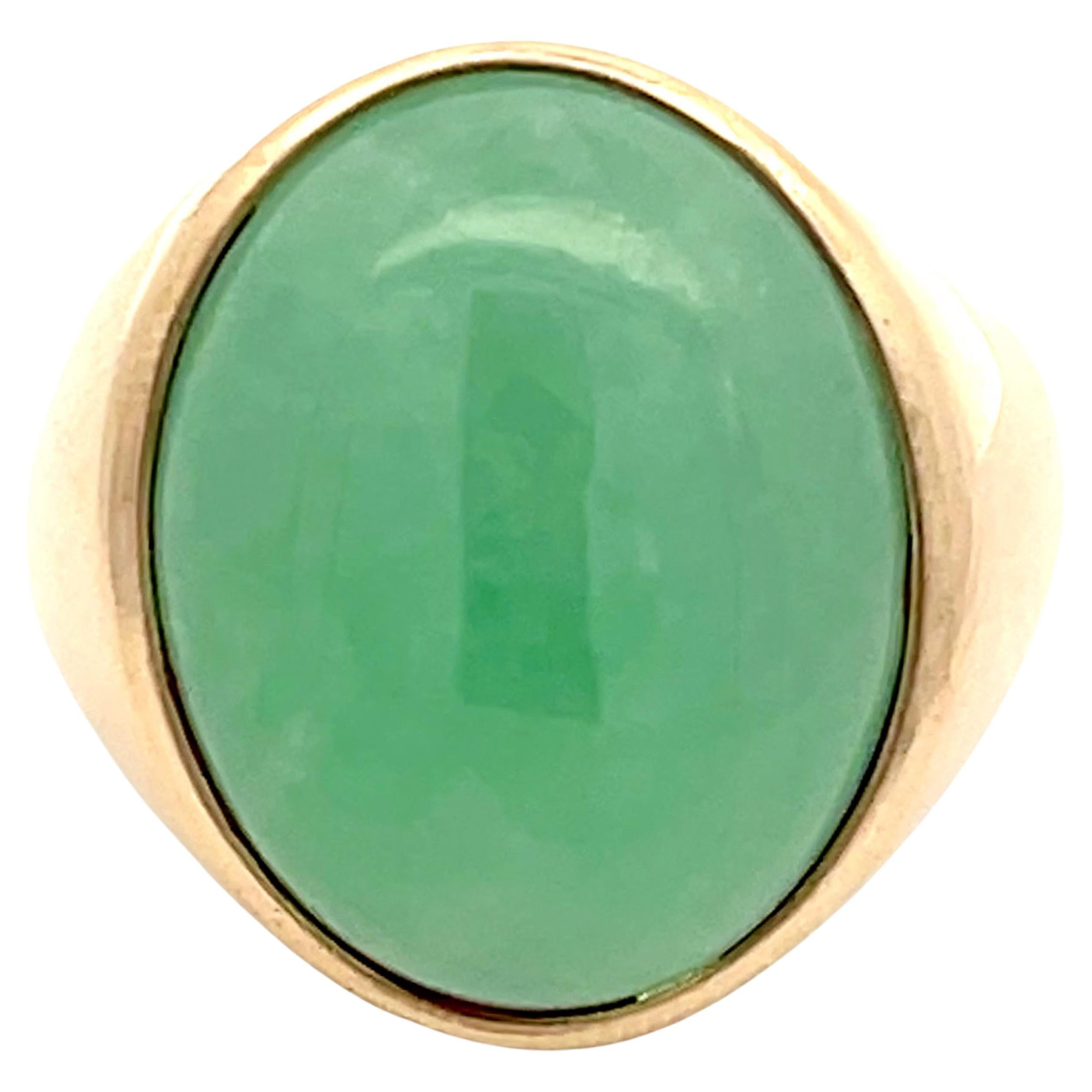 22 Carat Oval Cabochon Green Jade Ring in 14k Yellow Gold For Sale