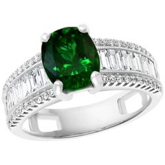 Antique 1.8 Carat Oval Tsavorite and 1.5 Carat Diamond in 14 Karat Gold Ring Estate