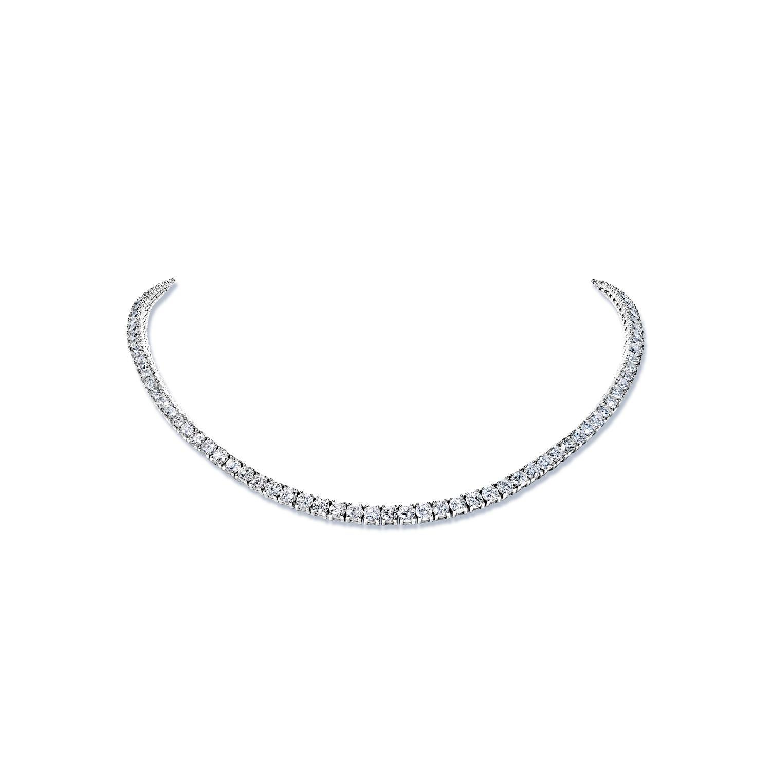 Earth Mined Diamond:
Carat Weight: 21.73 Carats
Style: Round Brilliant Cut
Chains: 14 Karat White Gold