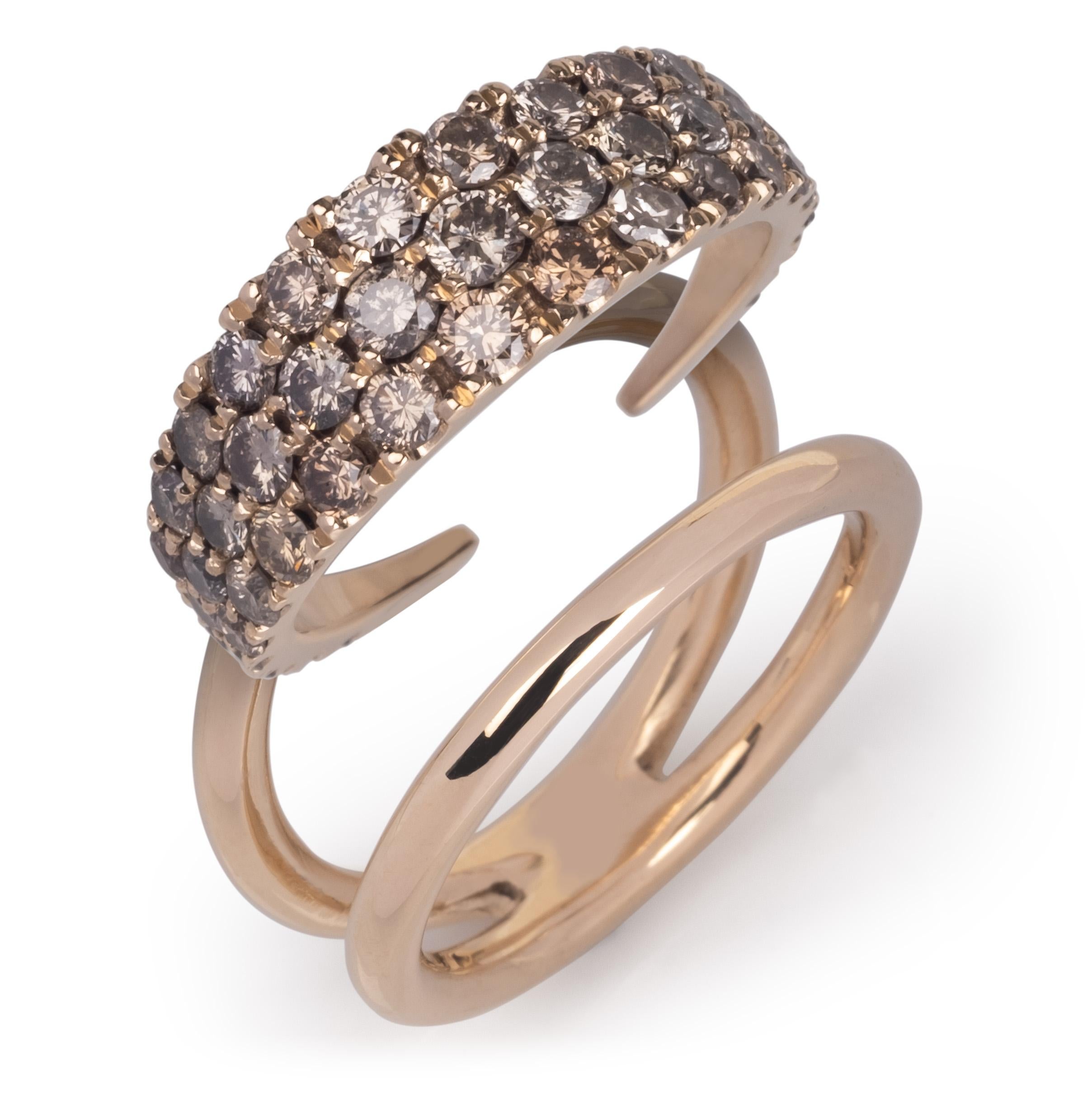 This sparkling champagne diamond ring has a surprise! It's actually a two-piece interchangeable ring. The wedge inserts into the outside ring and creates endless possibilities. 
The rings are customizable and the combinations you choose will reflect
